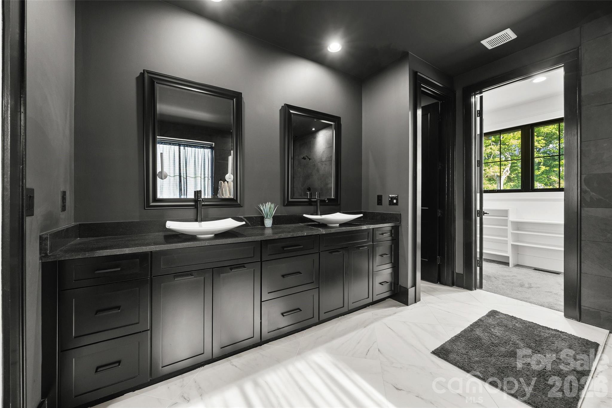 5438 Ralph Harper Lane Clover, SC 29710 - Photo 20 of 28 a bathroom with a sink a vanity and a mirror