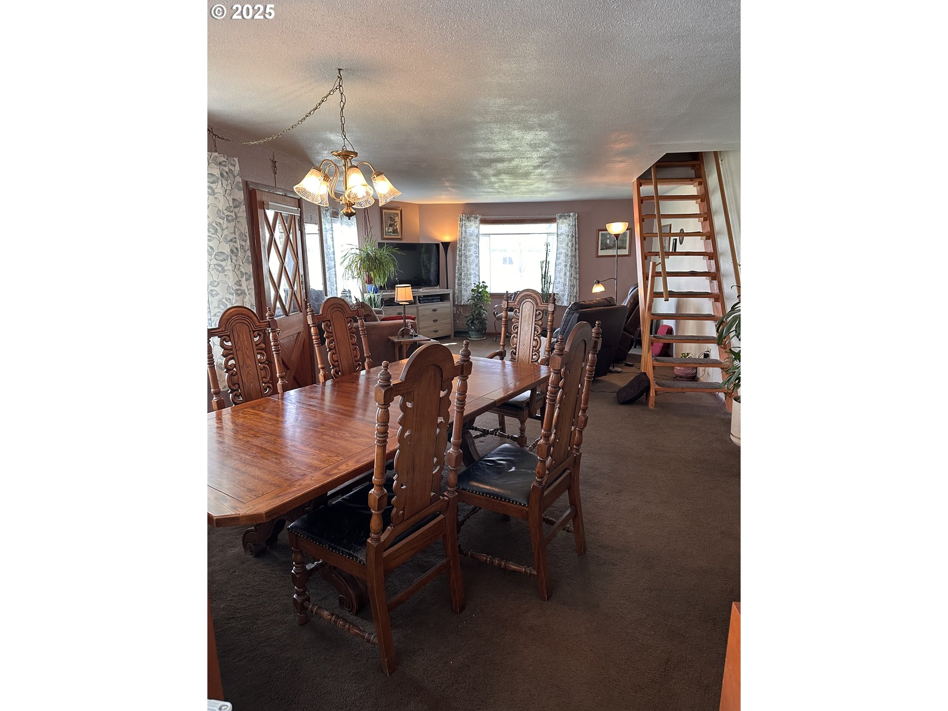 309 East Van Buren Street Athena, OR 97813 - Photo 11 of 31 a view of a dining room with furniture and chandelier