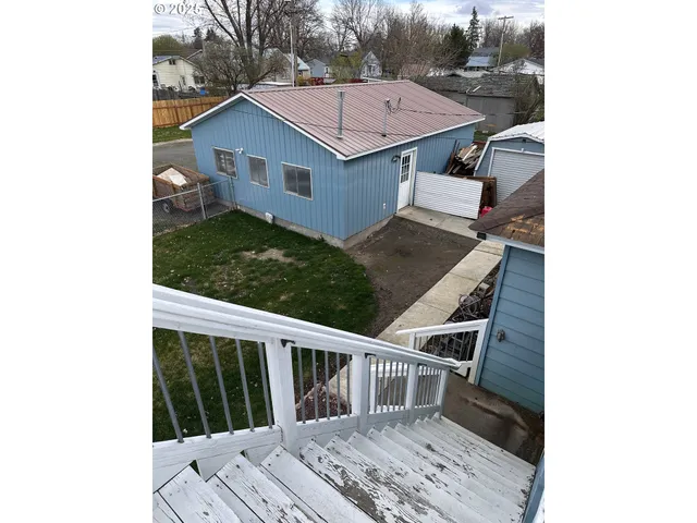 a view of parking garage with cars