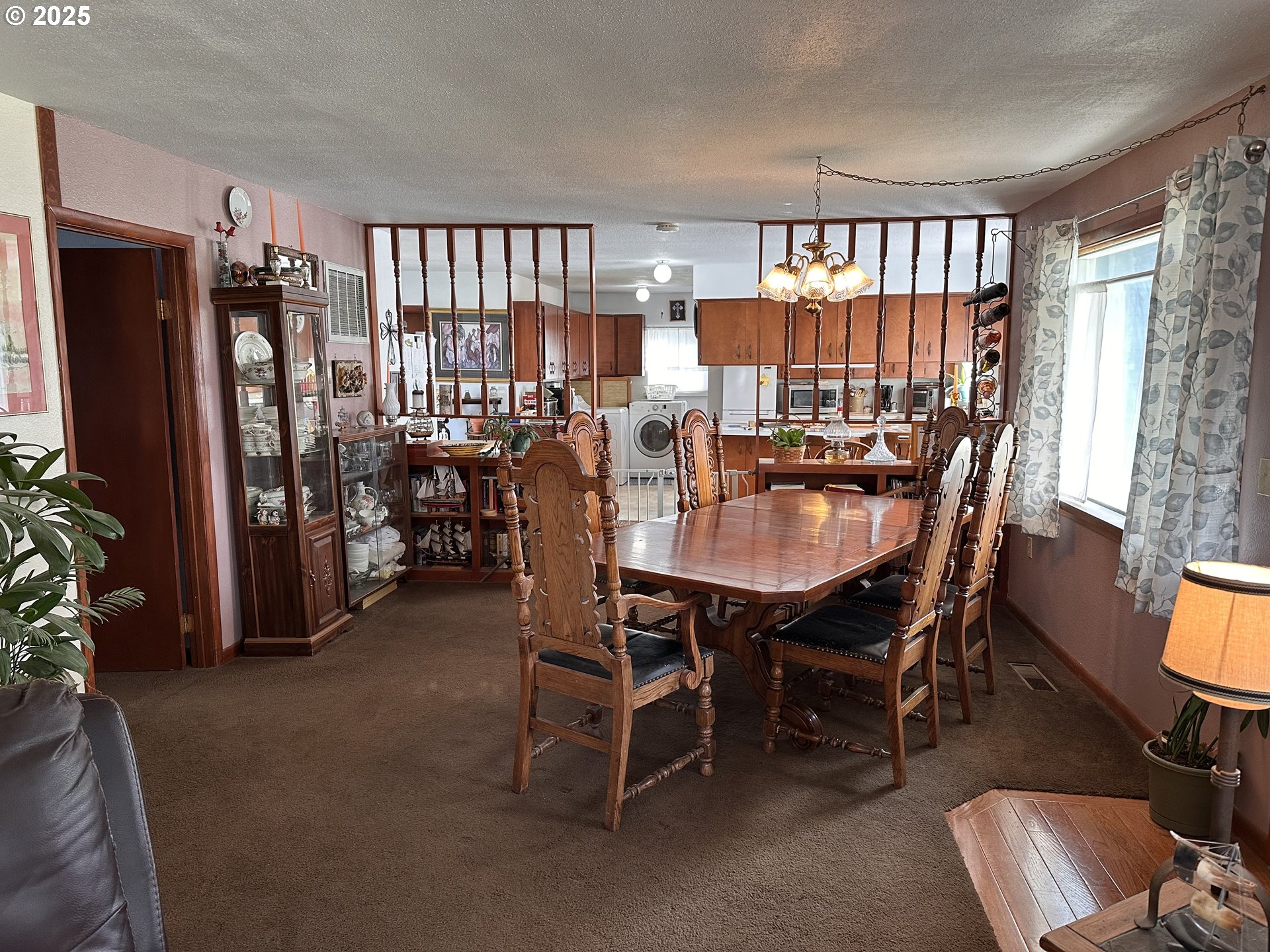 309 East Van Buren Street Athena, OR 97813 - Photo 10 of 31 a dining room with furniture window and wooden floor