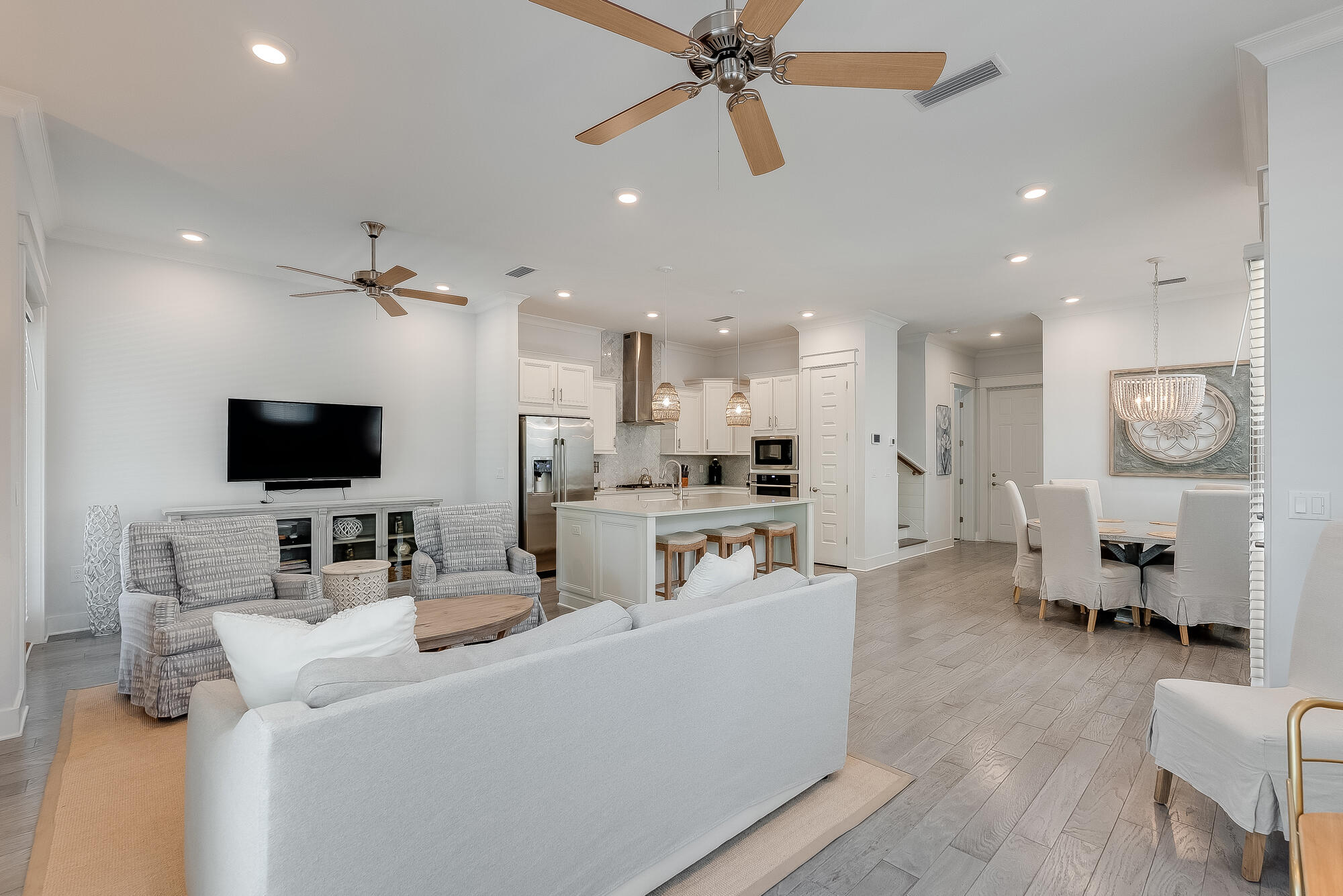 239 Milestone Drive, Unit A Inlet Beach, FL 32461 - Photo 11 of 39 a living room with furniture and a flat screen tv