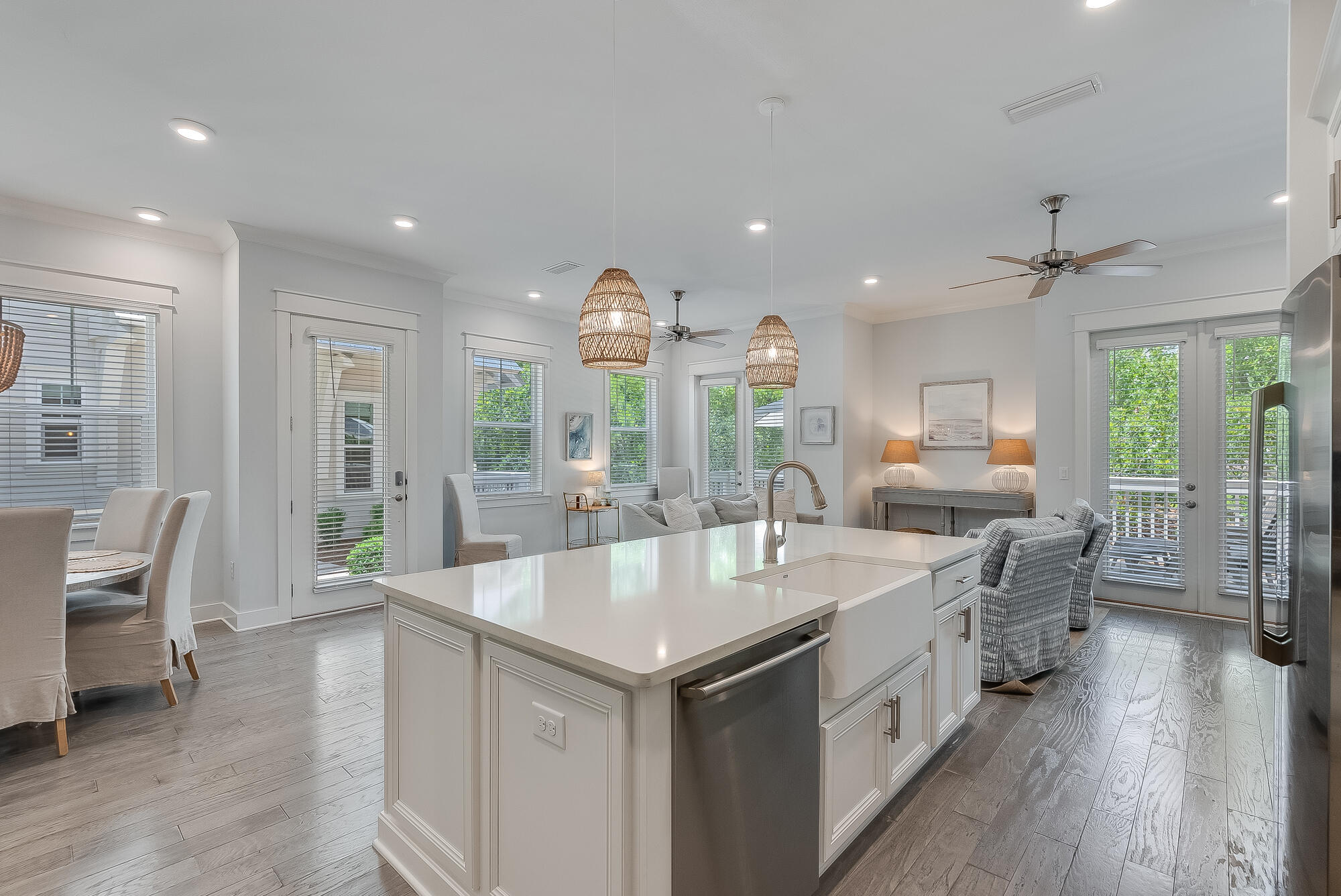 239 Milestone Drive, Unit A Inlet Beach, FL 32461 - Photo 16 of 39 a large kitchen with kitchen island a island a sink a stove and wooden floor