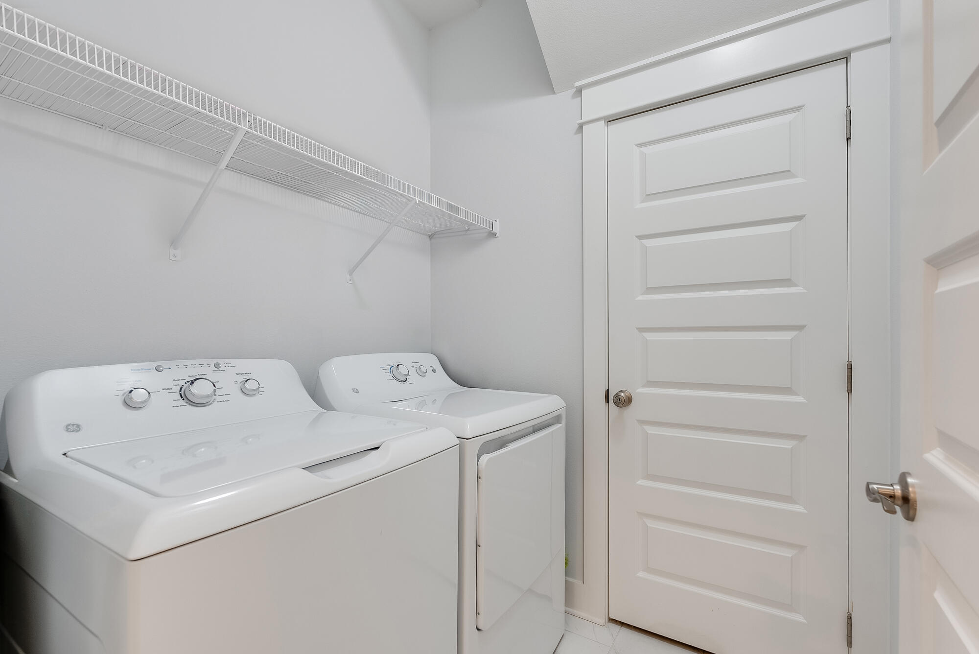 239 Milestone Drive, Unit A Inlet Beach, FL 32461 - Photo 19 of 39 a utility room with dryer and washer