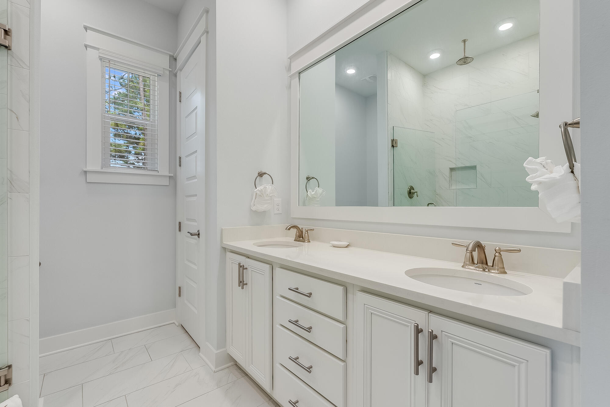 239 Milestone Drive, Unit A Inlet Beach, FL 32461 - Photo 26 of 39 a bathroom with 2 sink tub and a mirror