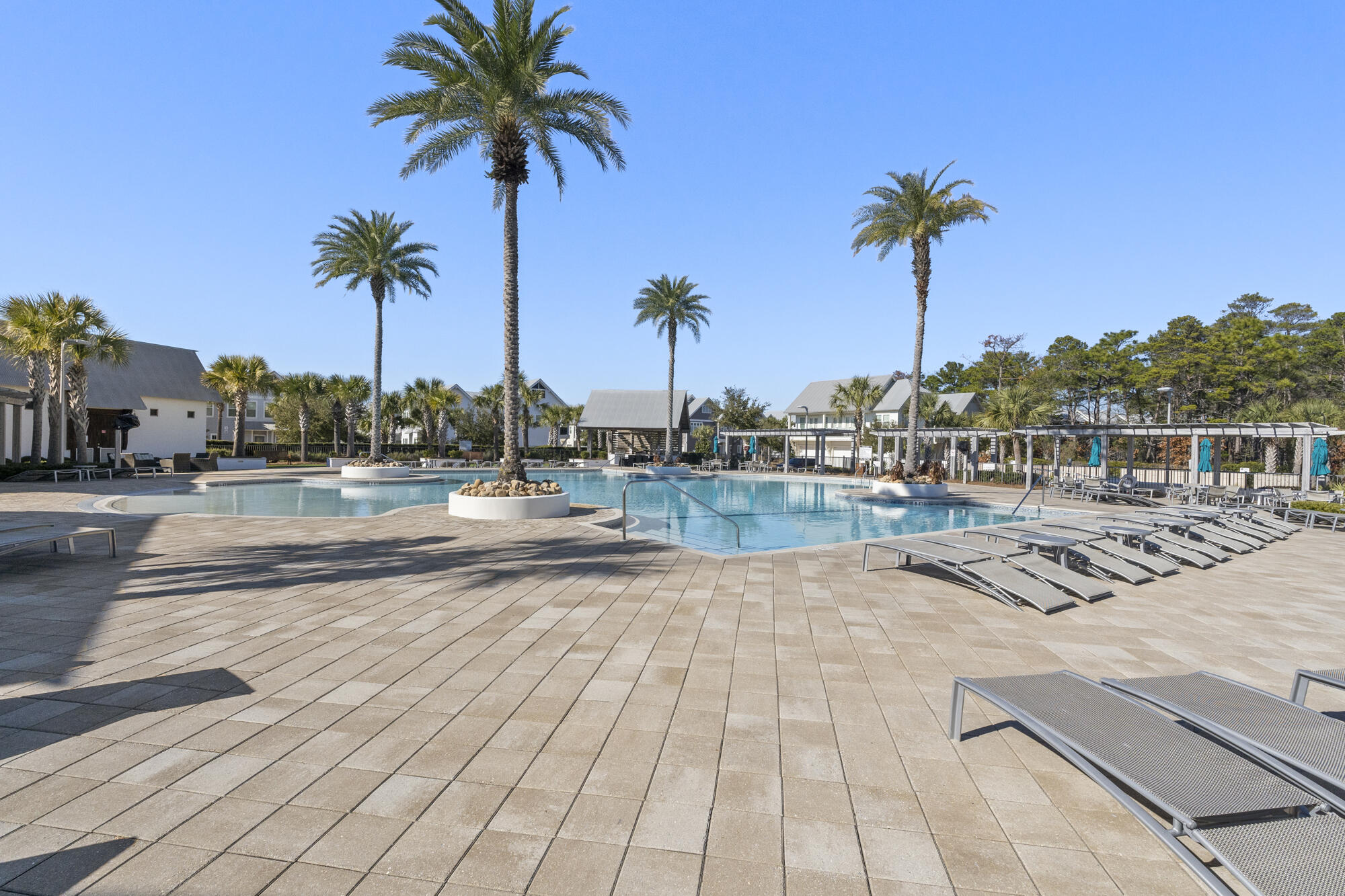 239 Milestone Drive, Unit A Inlet Beach, FL 32461 - Photo 34 of 39 a view of a terrace with palm trees