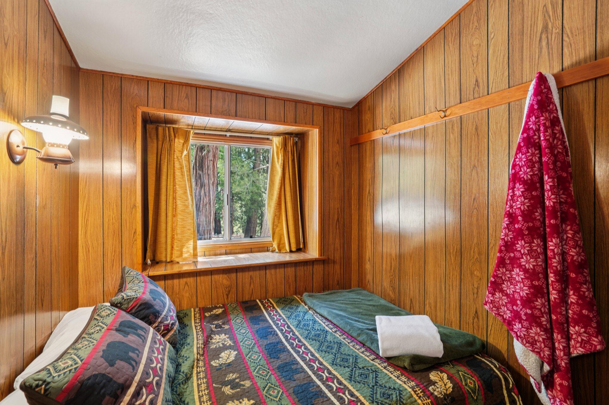 55280 Circle Way Idyllwild, CA 92549 - Photo 7 of 27 a bed sitting in a bedroom next to a window