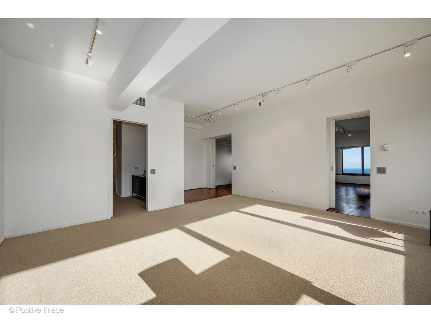 175 East Delaware Place, Unit 5116 Chicago, IL 60611 - Photo 31 of 43 a bedroom with a bed and a television