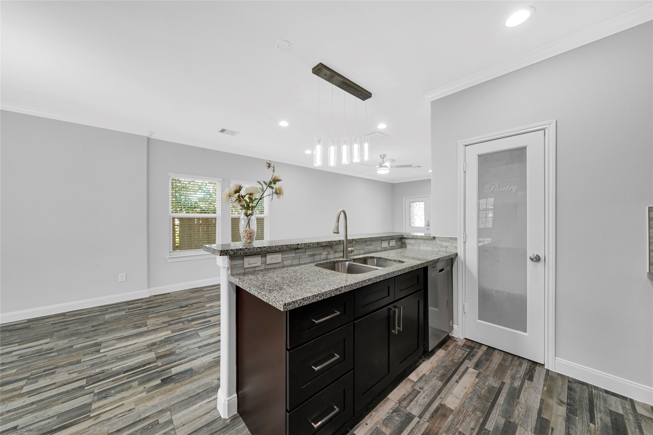 4732 Carmen Street, Unit A Houston, TX 77033 - Photo 11 of 26 a kitchen with a stove and a sink