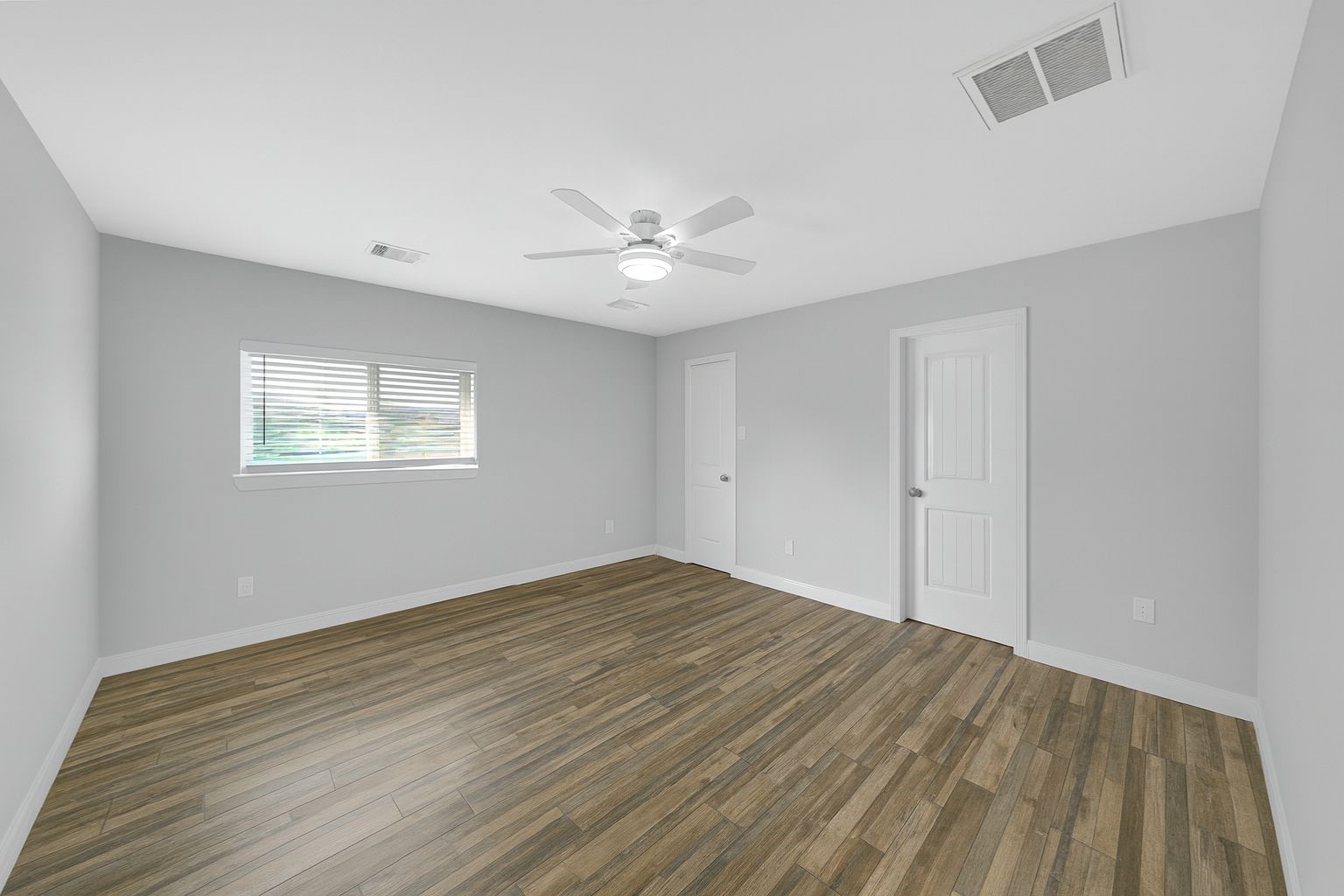 4732 Carmen Street, Unit A Houston, TX 77033 - Photo 13 of 26 a view of an empty room with a window