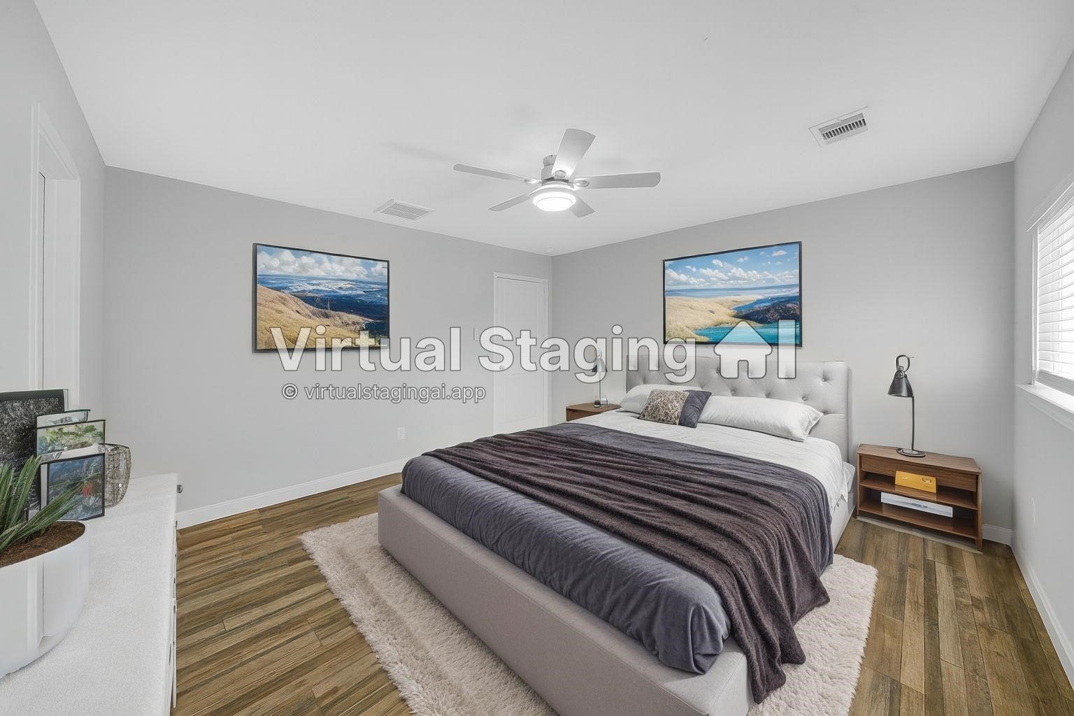 4732 Carmen Street, Unit A Houston, TX 77033 - Photo 18 of 26 a bedroom with a large bed and a chandelier