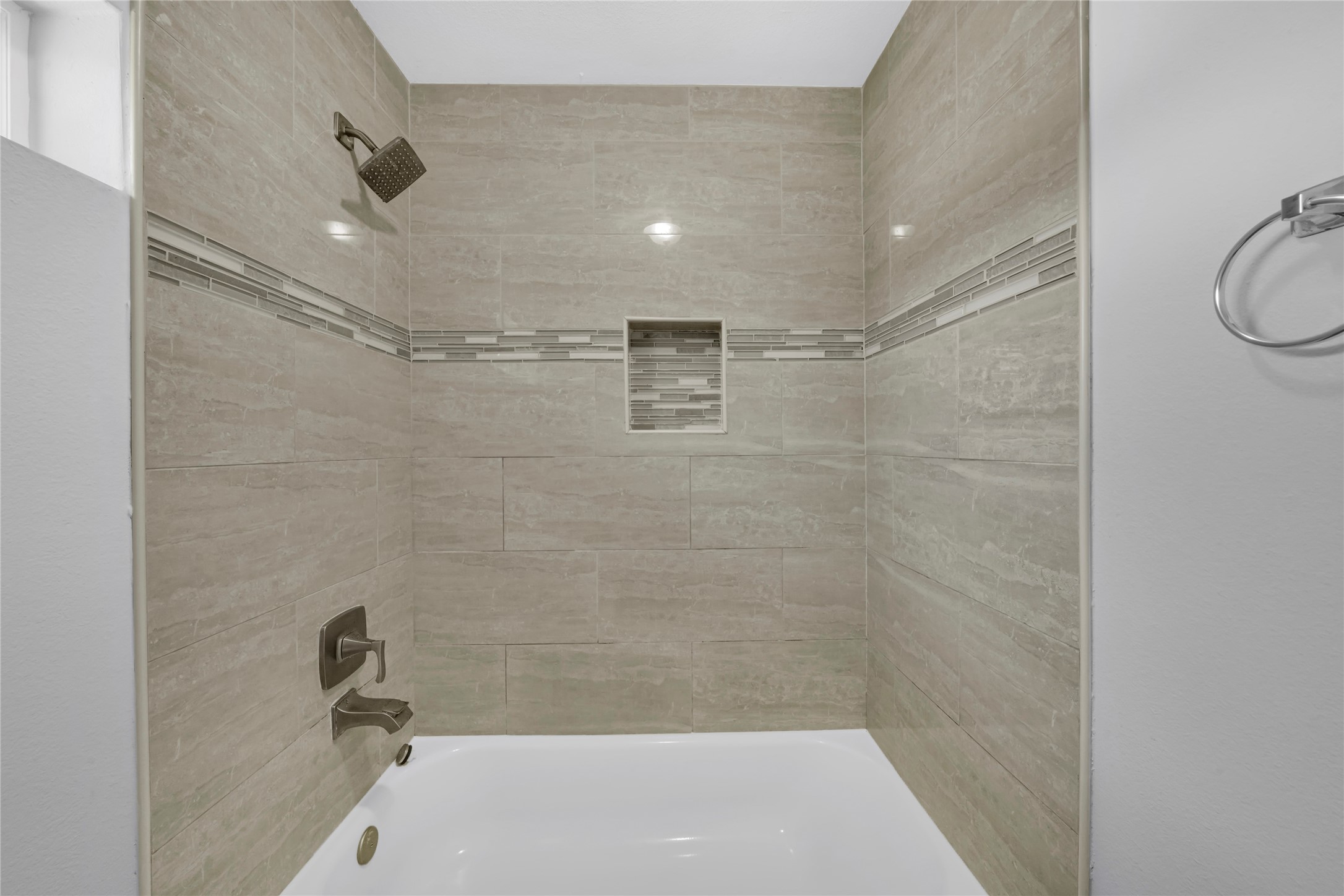 4732 Carmen Street, Unit A Houston, TX 77033 - Photo 20 of 26 a bathroom with a shower and a bathtub