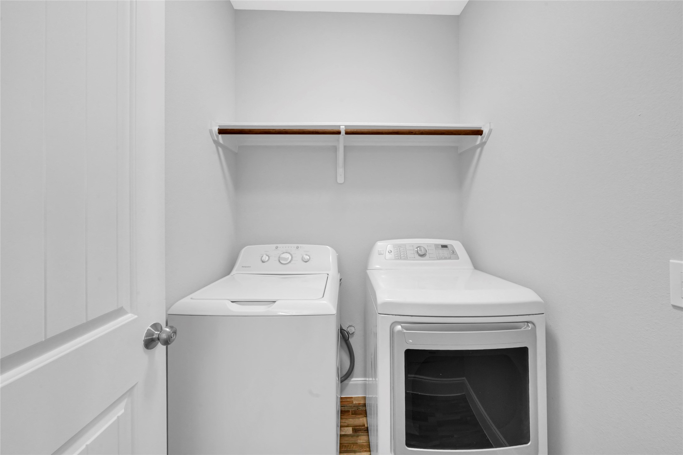 4732 Carmen Street, Unit A Houston, TX 77033 - Photo 24 of 26 a utility room with dryer and washer