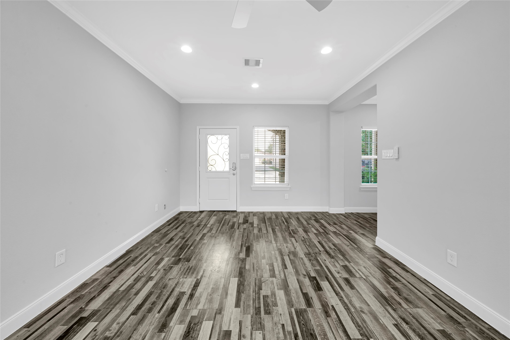 4732 Carmen Street, Unit A Houston, TX 77033 - Photo 6 of 26 a view of an empty room and window