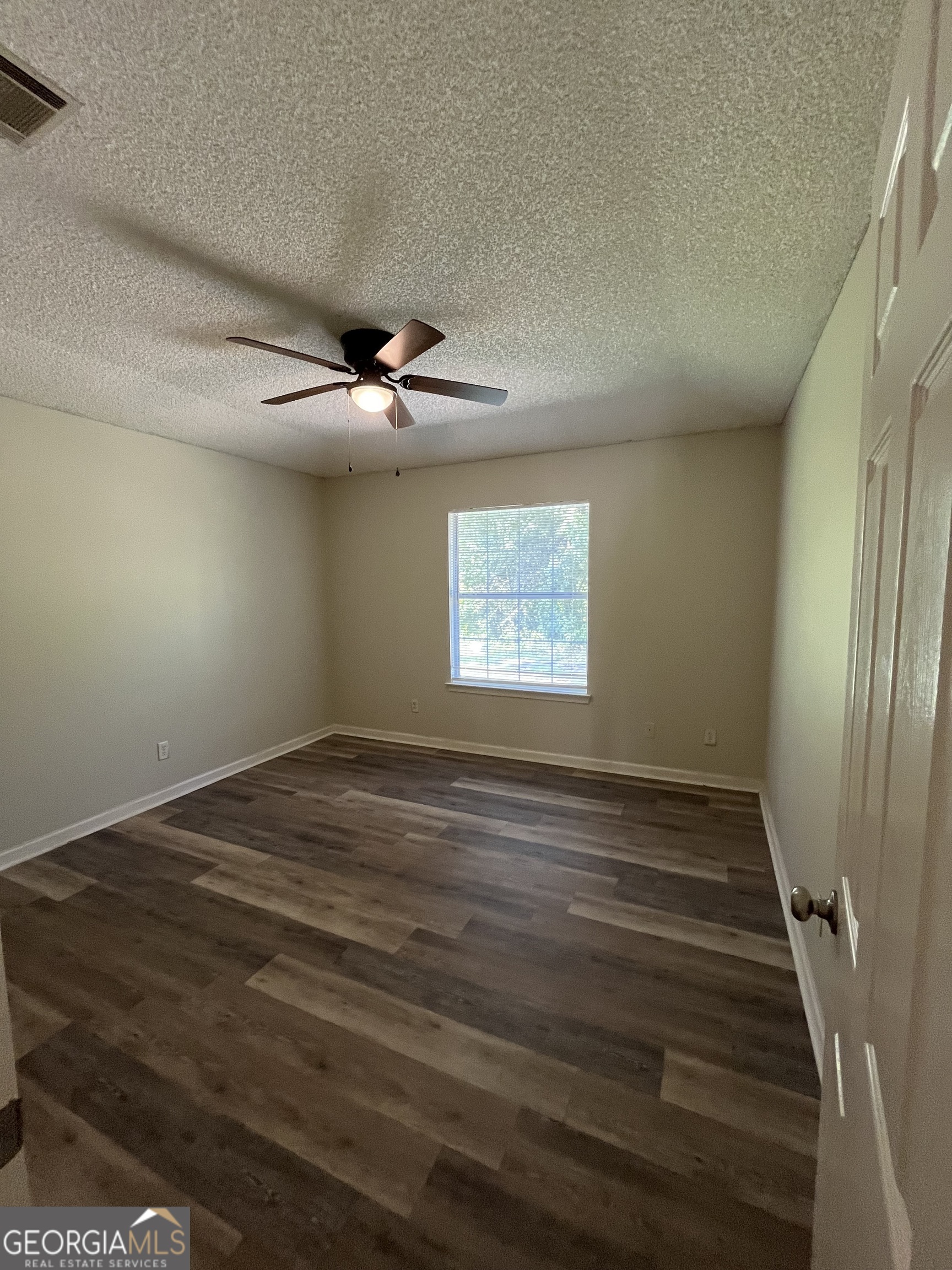 120 Sapelo Drive St. Marys, GA 31558 - Photo 15 of 24 wooden floor in an empty room