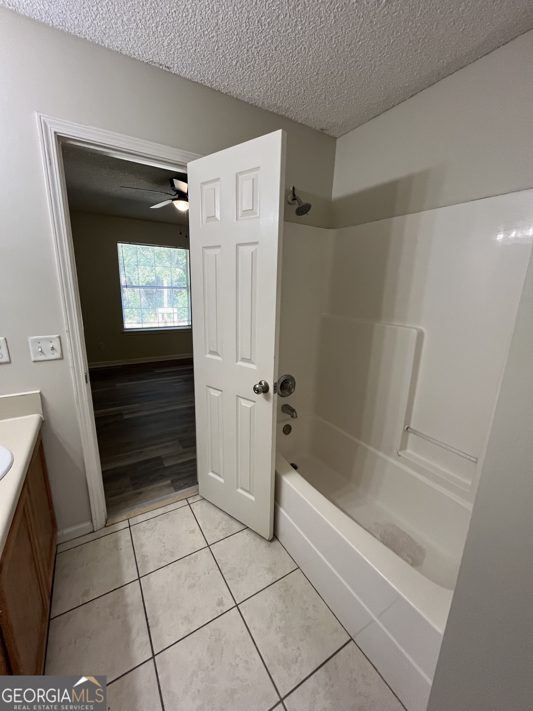 120 Sapelo Drive St. Marys, GA 31558 - Photo 19 of 24 a bathroom with a bathtub and a shower