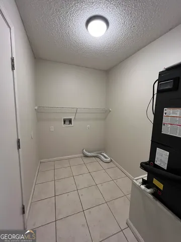 a view of a room with racks on the wall