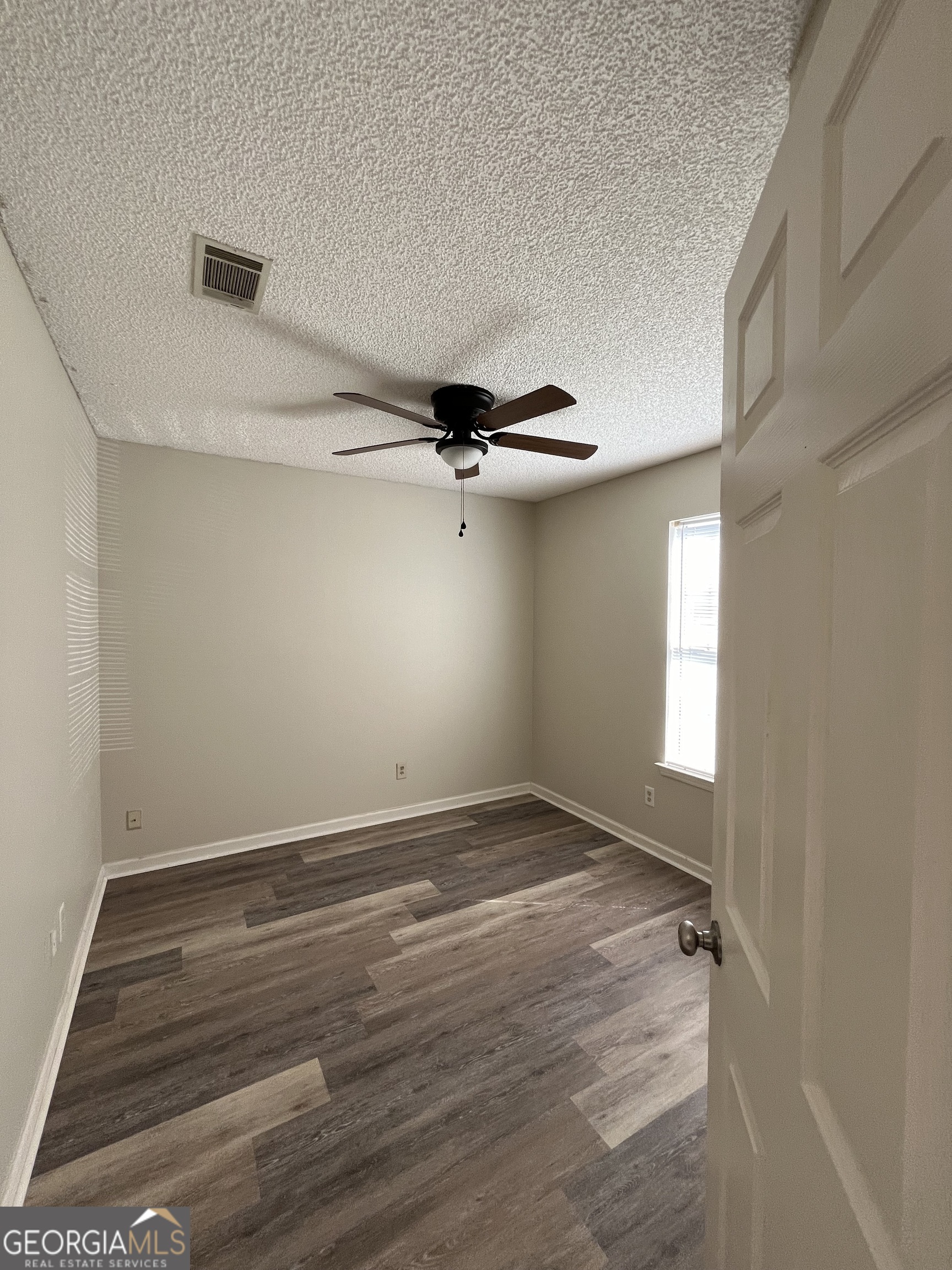 120 Sapelo Drive St. Marys, GA 31558 - Photo 3 of 24 wooden floor in an empty room