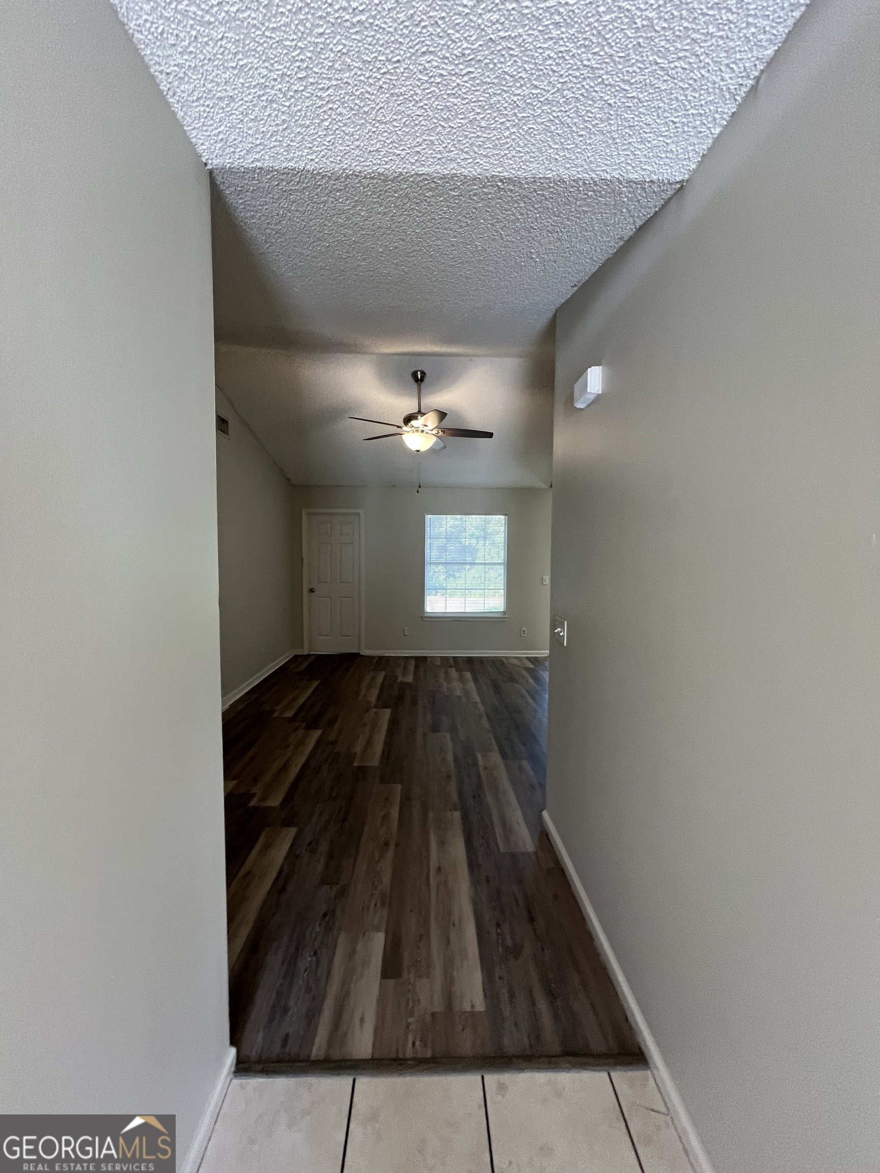 120 Sapelo Drive St. Marys, GA 31558 - Photo 6 of 24 a view of kitchen space with wooden floor