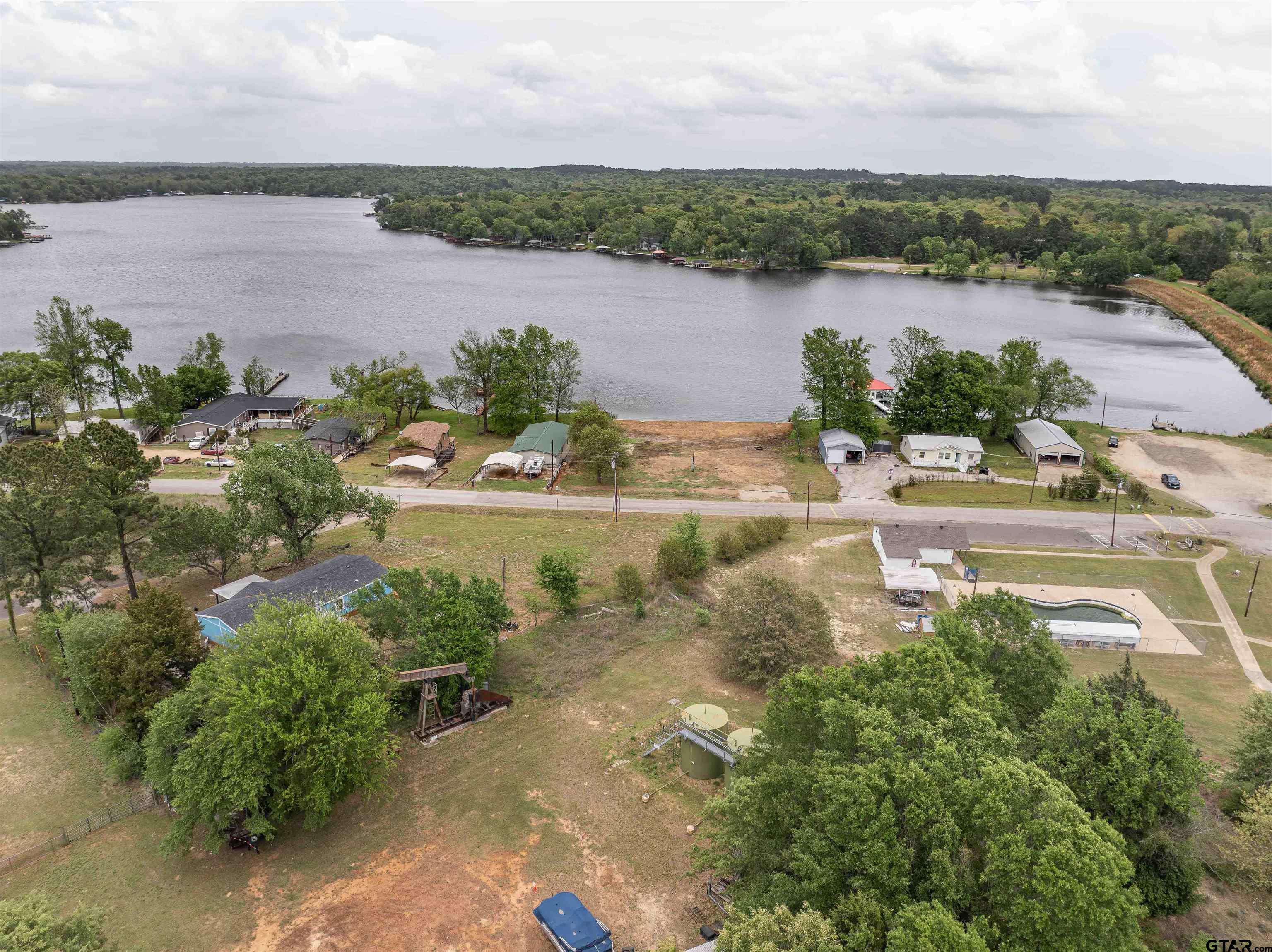 161 Clearview Circle Murchison, TX 75778 - Photo 14 of 47 an aerial view of lake residential house with outdoor space and trees around