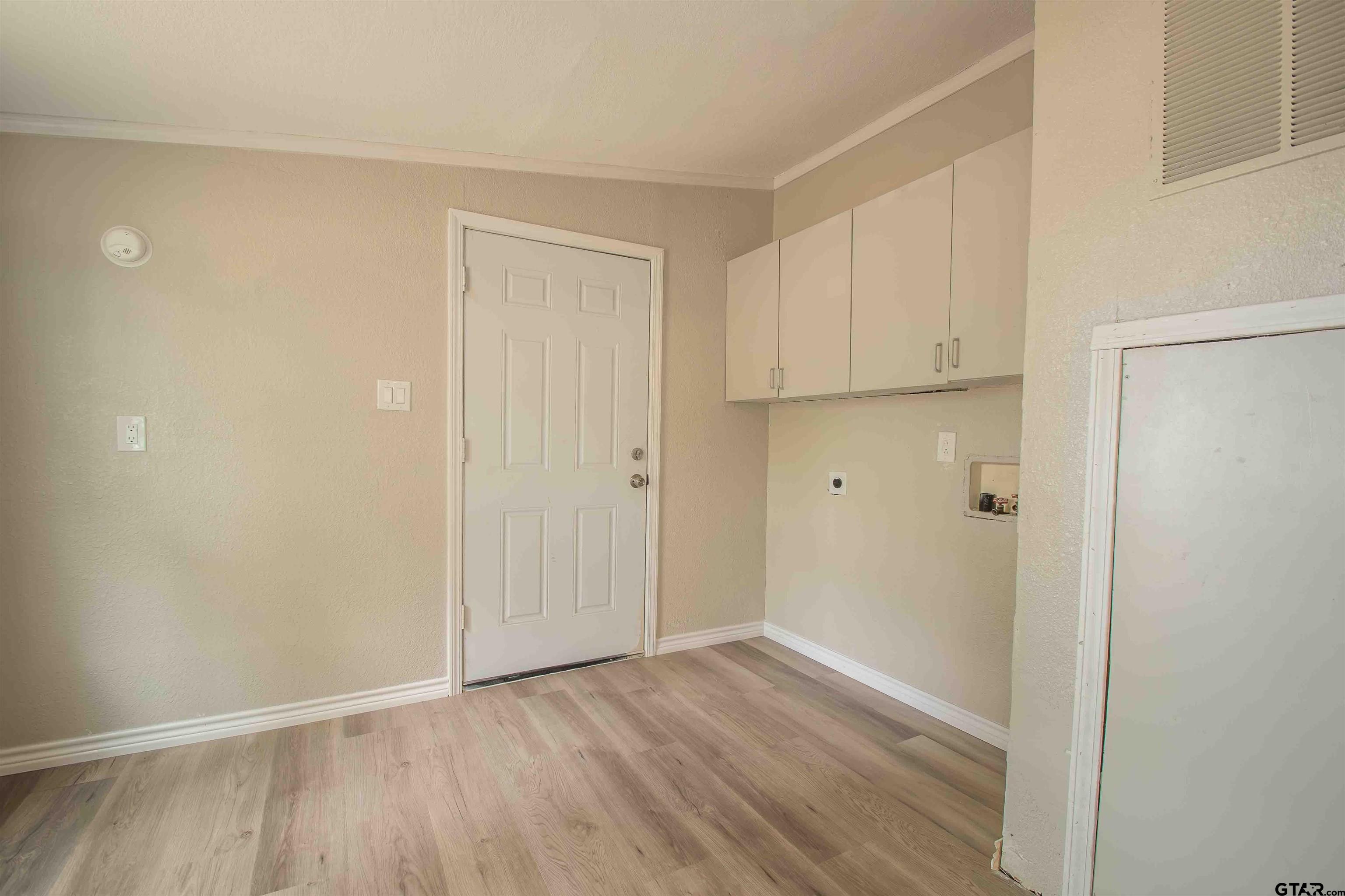 161 Clearview Circle Murchison, TX 75778 - Photo 24 of 47 a view of room with hardwood floor