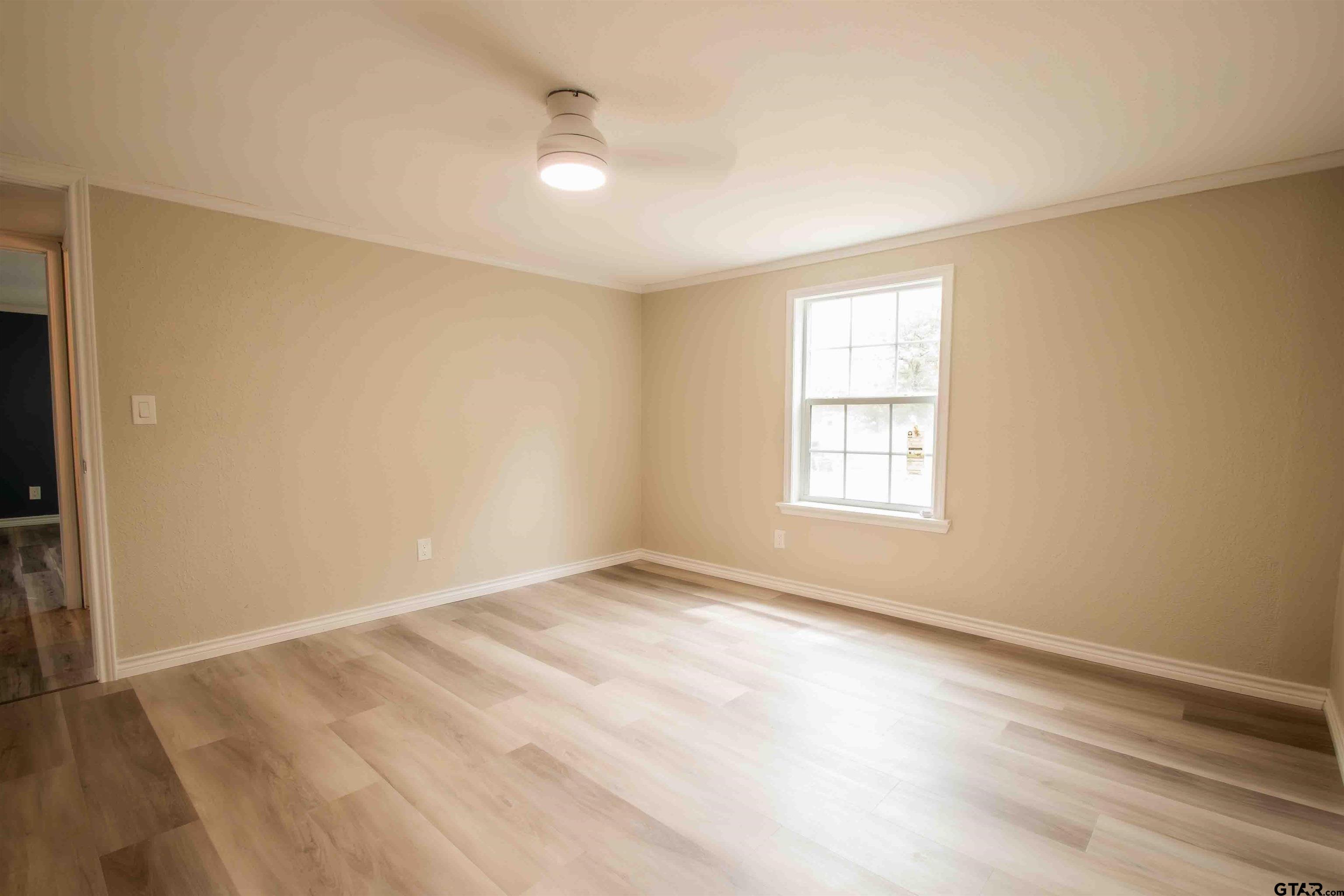 161 Clearview Circle Murchison, TX 75778 - Photo 32 of 47 a view of an empty room with a window