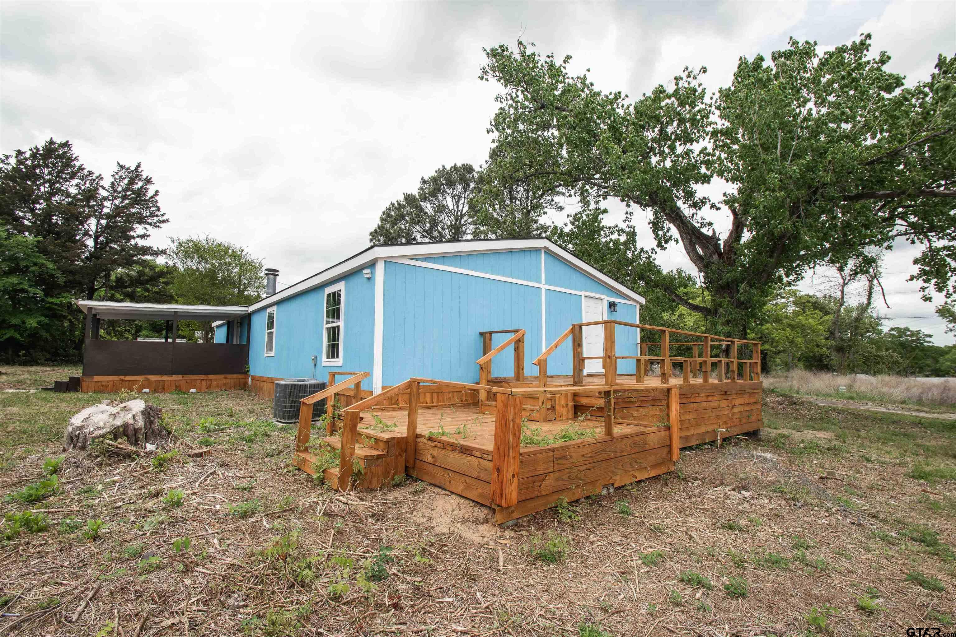 161 Clearview Circle Murchison, TX 75778 - Photo 10 of 47 a view of a house with backyard