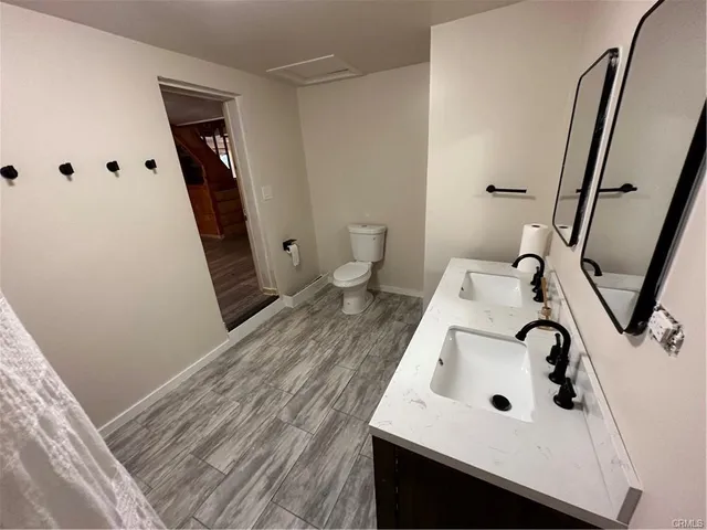 a bathroom with a sink and mirror