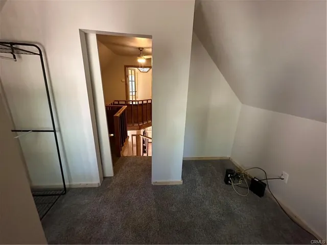 a view of a hallway with closet