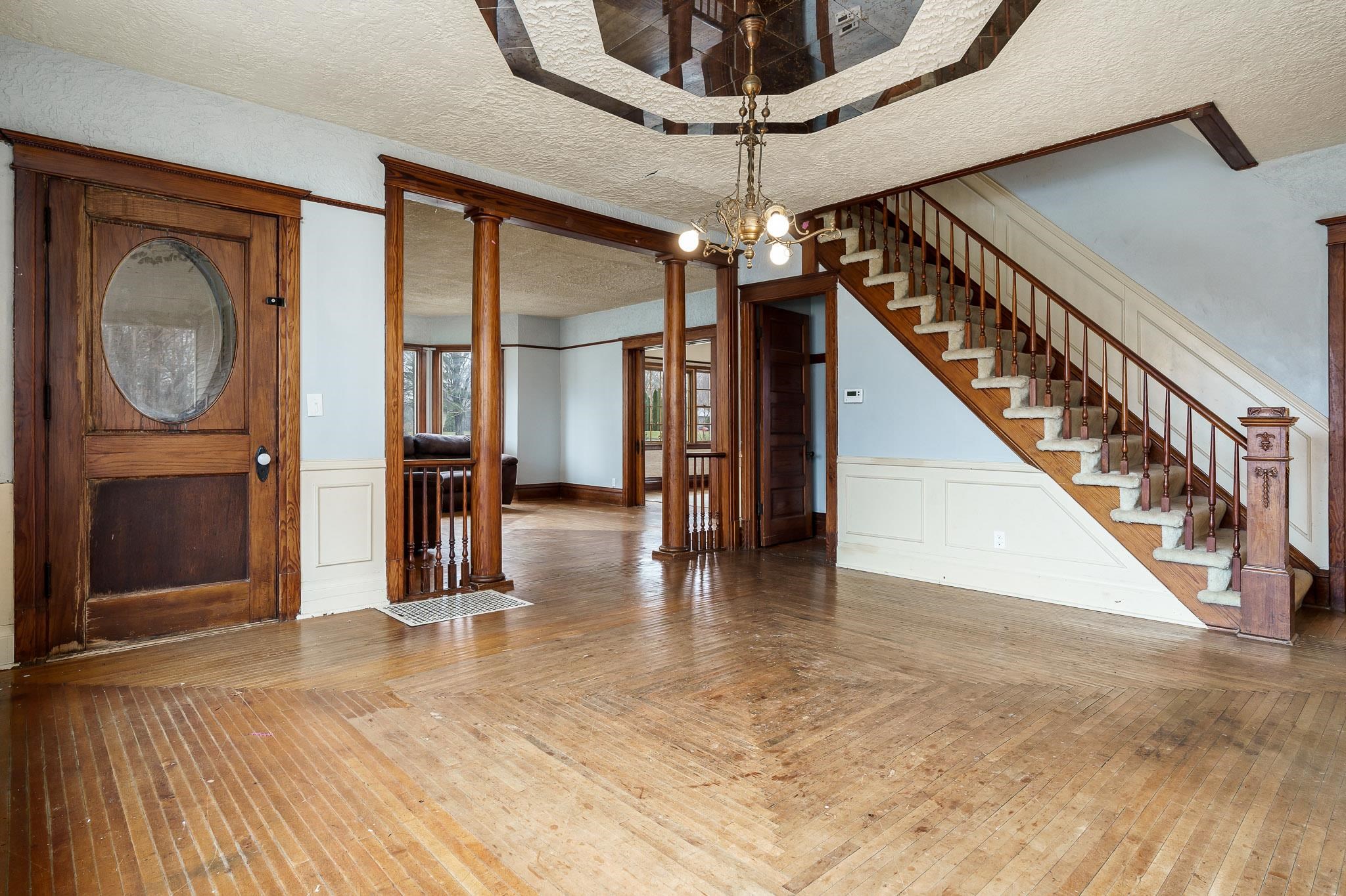 2826 Orth Road Belvidere, IL 61008 - Photo 16 of 43 a view of entryway and hall with wooden floor