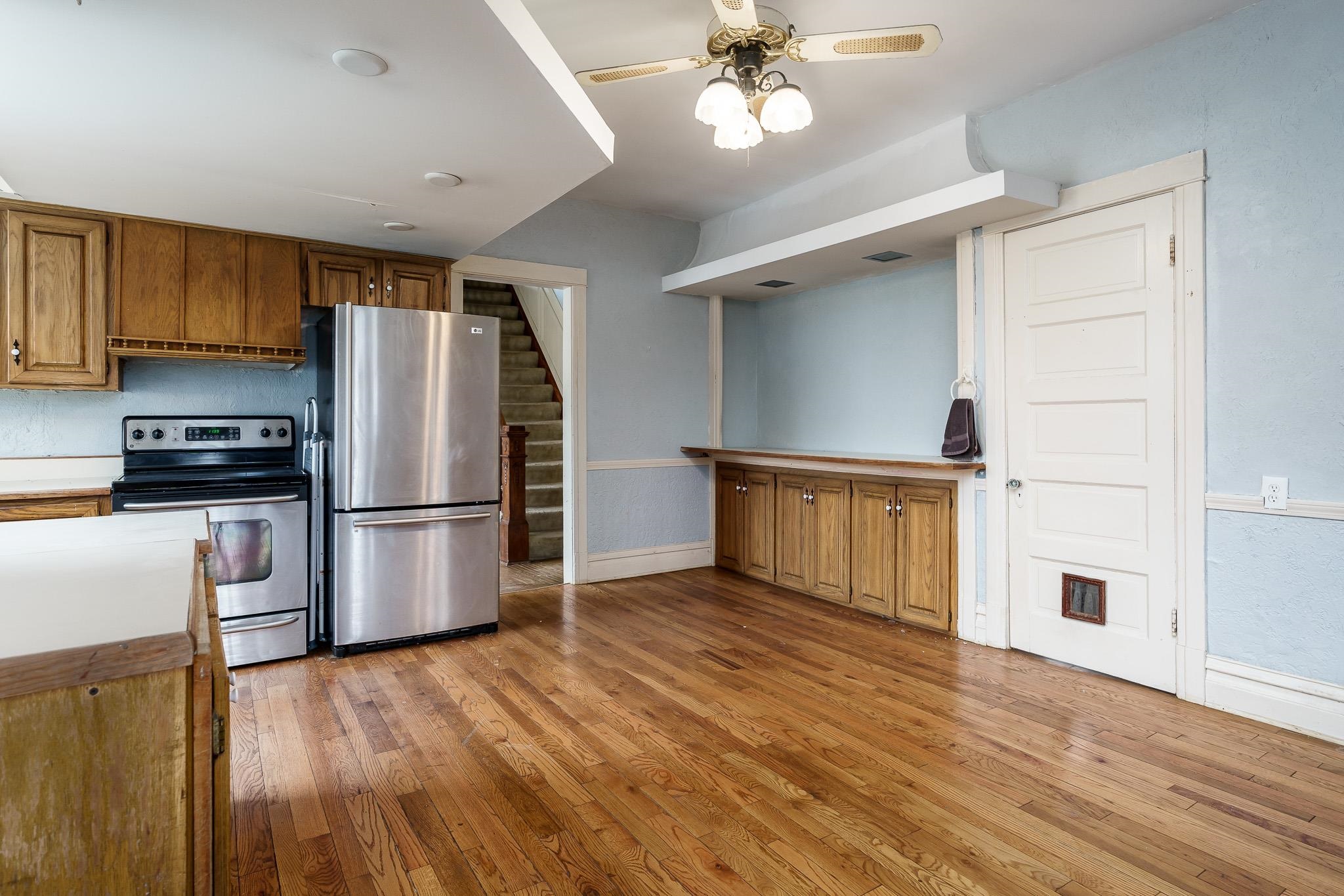 2826 Orth Road Belvidere, IL 61008 - Photo 19 of 43 a kitchen with stainless steel appliances a refrigerator and a stove top oven