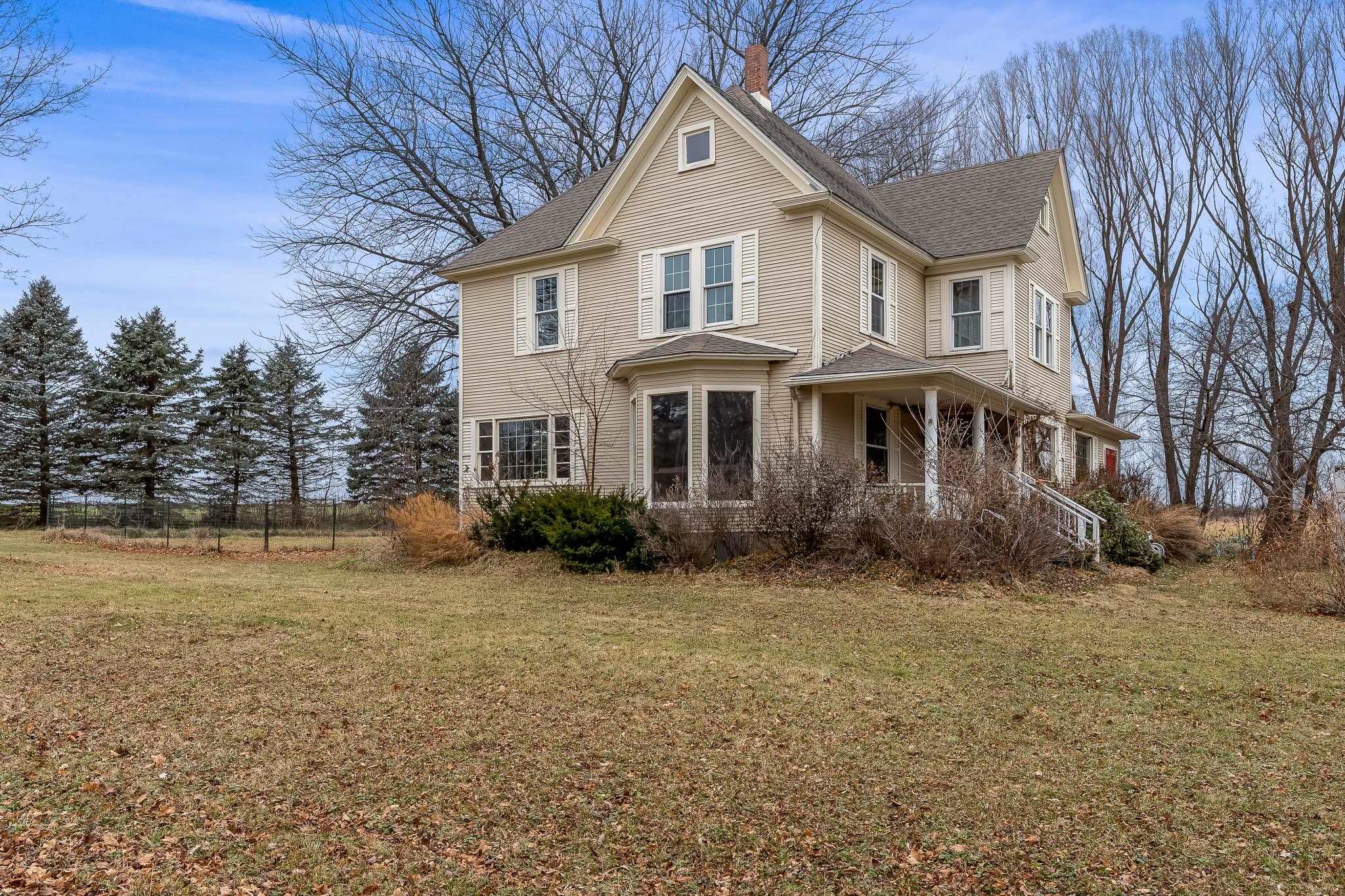 2826 Orth Road Belvidere, IL 61008 - Photo 2 of 43 a front view of a house with a yard