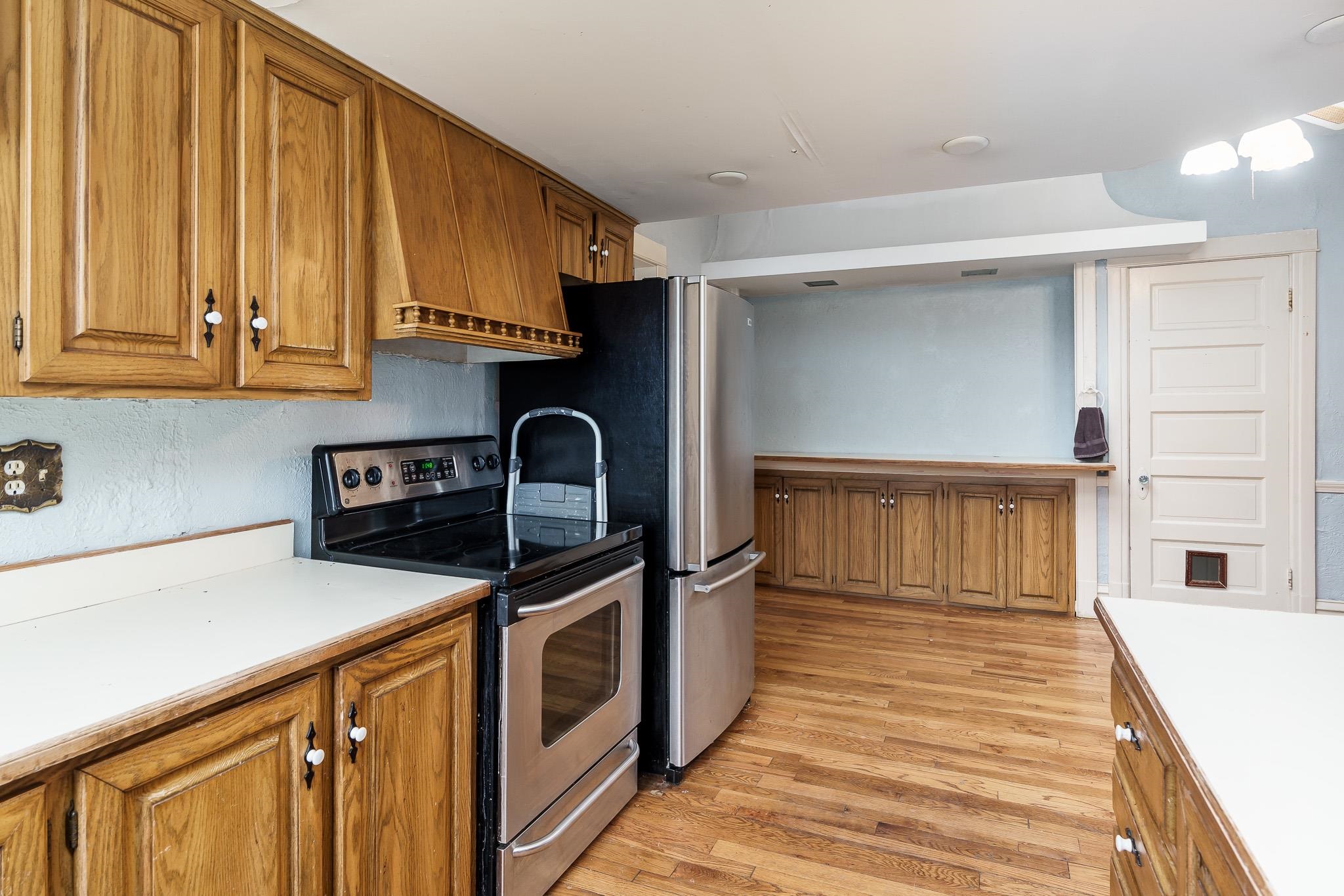 2826 Orth Road Belvidere, IL 61008 - Photo 25 of 43 a kitchen with stainless steel appliances granite countertop a stove and a sink
