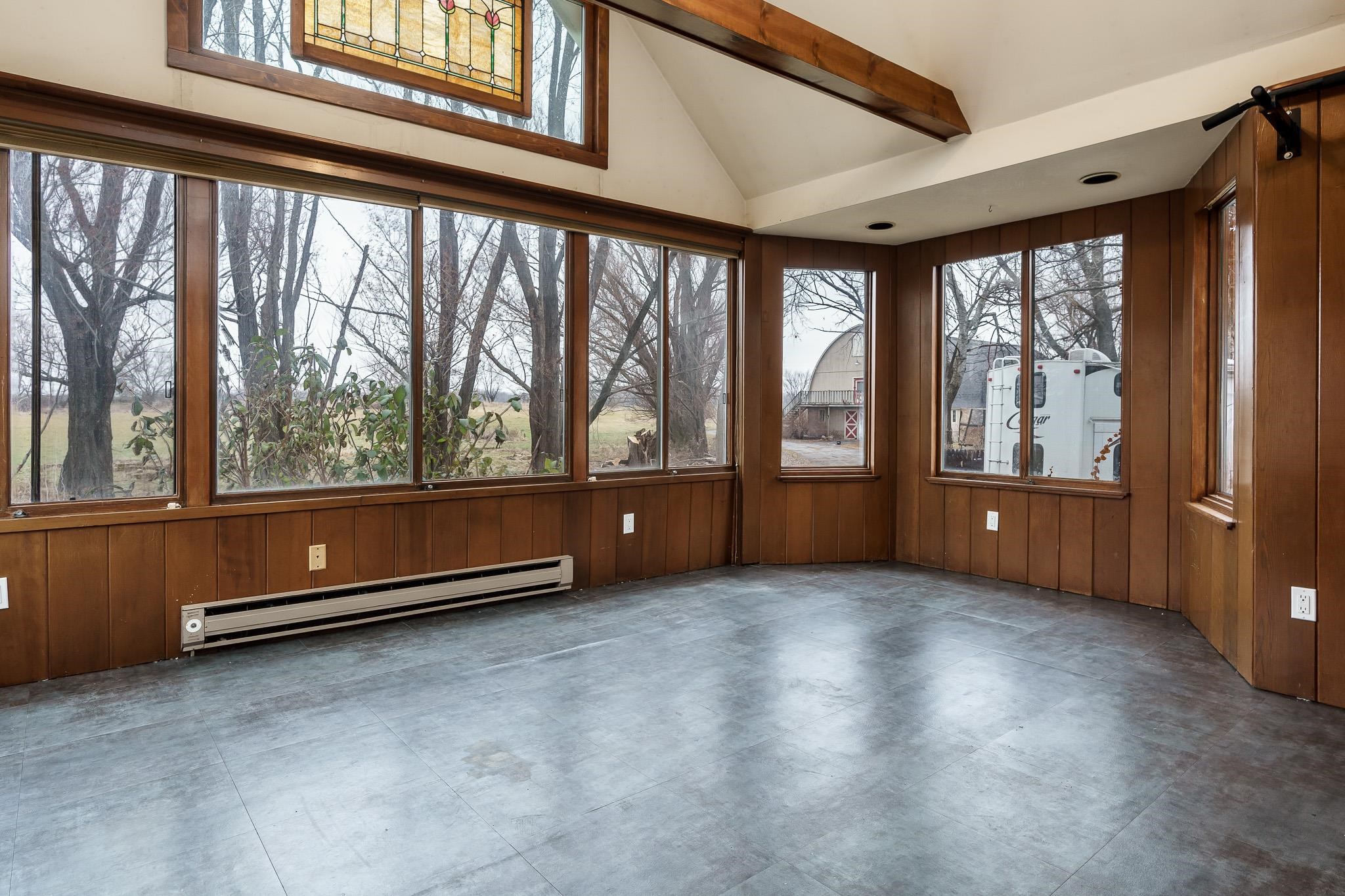 2826 Orth Road Belvidere, IL 61008 - Photo 27 of 43 an empty room with wooden floor and windows