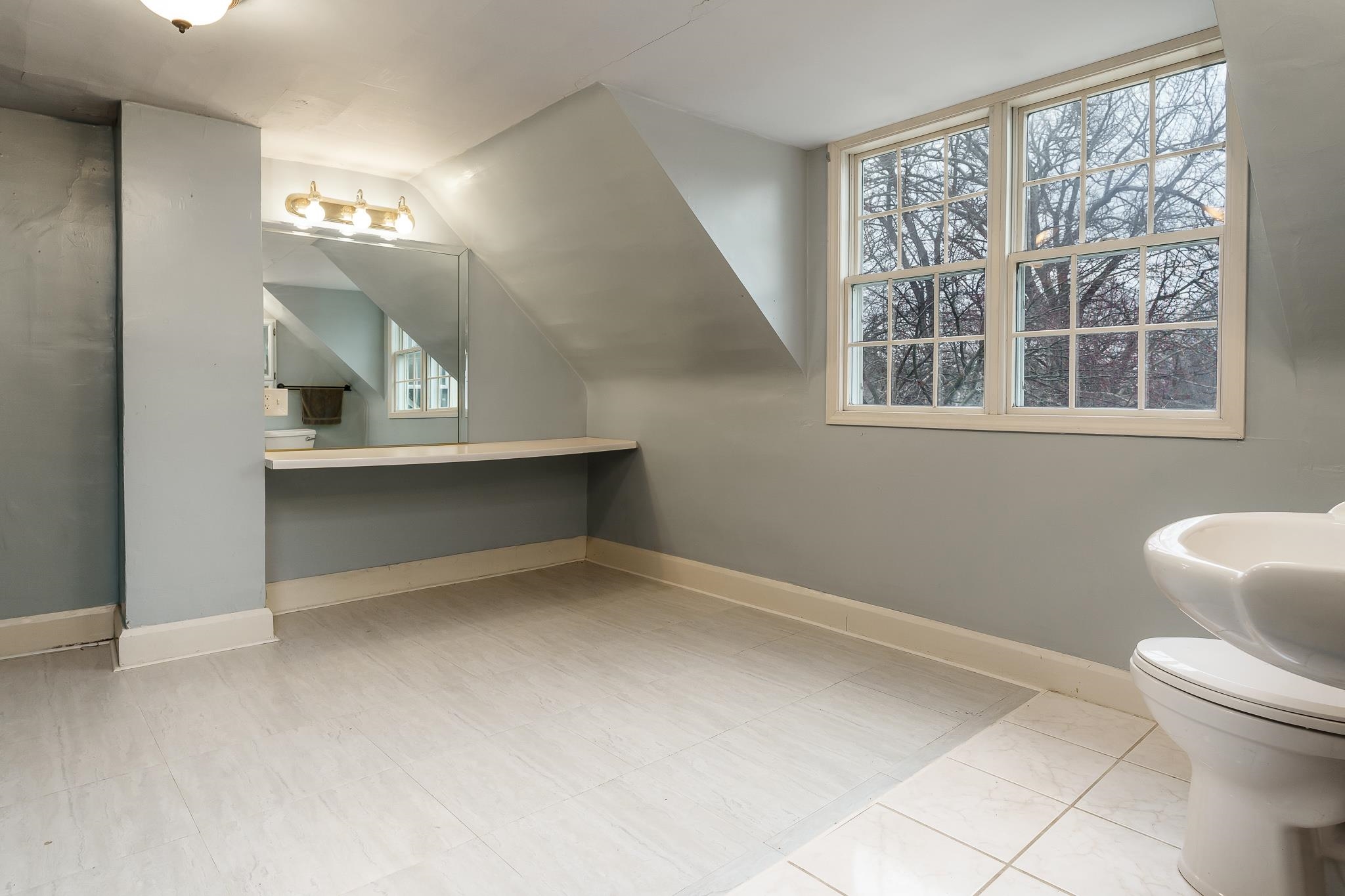 2826 Orth Road Belvidere, IL 61008 - Photo 42 of 43 a view of an empty room with a window and bathroom