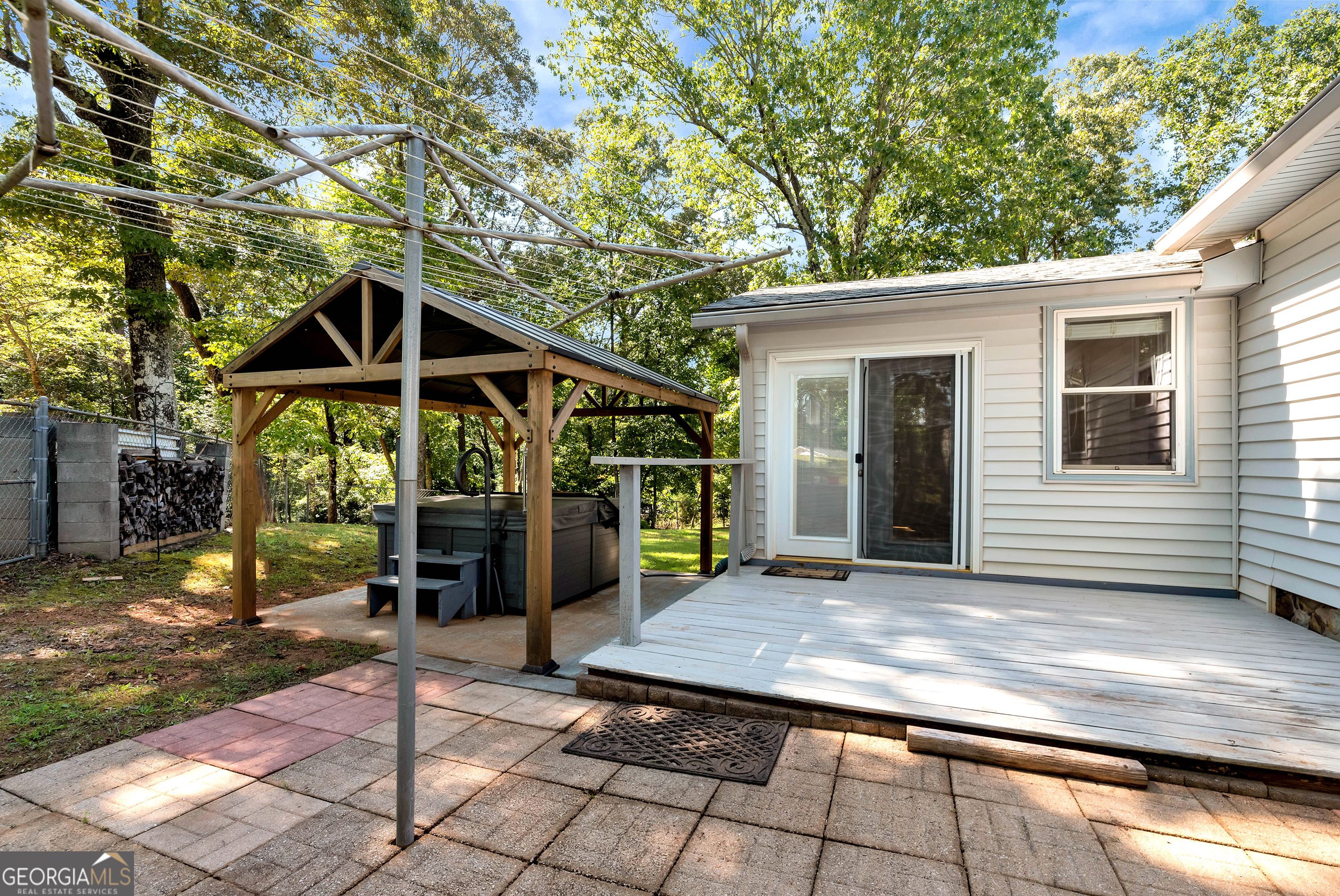 303 Jennys Cove Road Cleveland, GA 30528 - Photo 27 of 60 a view of a house with a porch