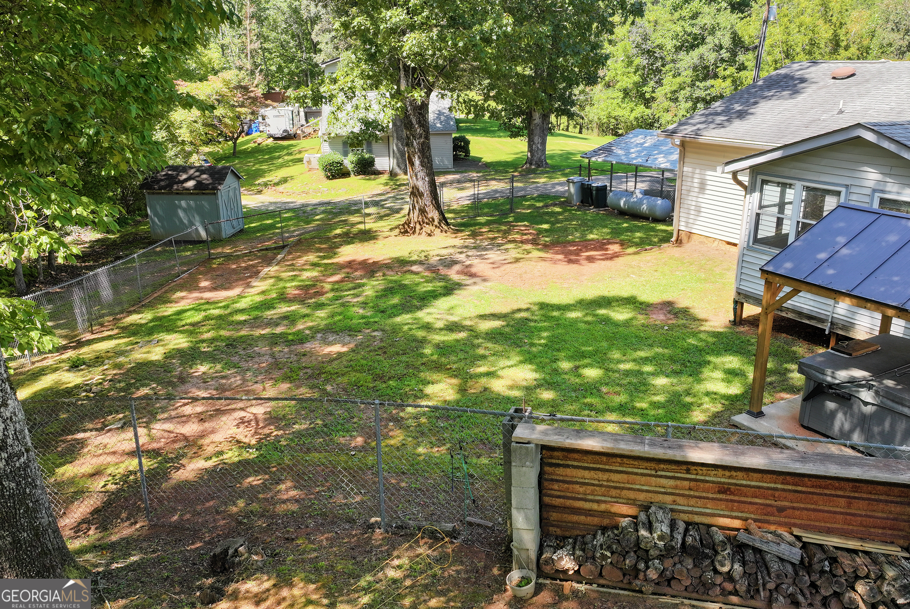 303 Jennys Cove Road Cleveland, GA 30528 - Photo 28 of 60 a view of a yard with plants