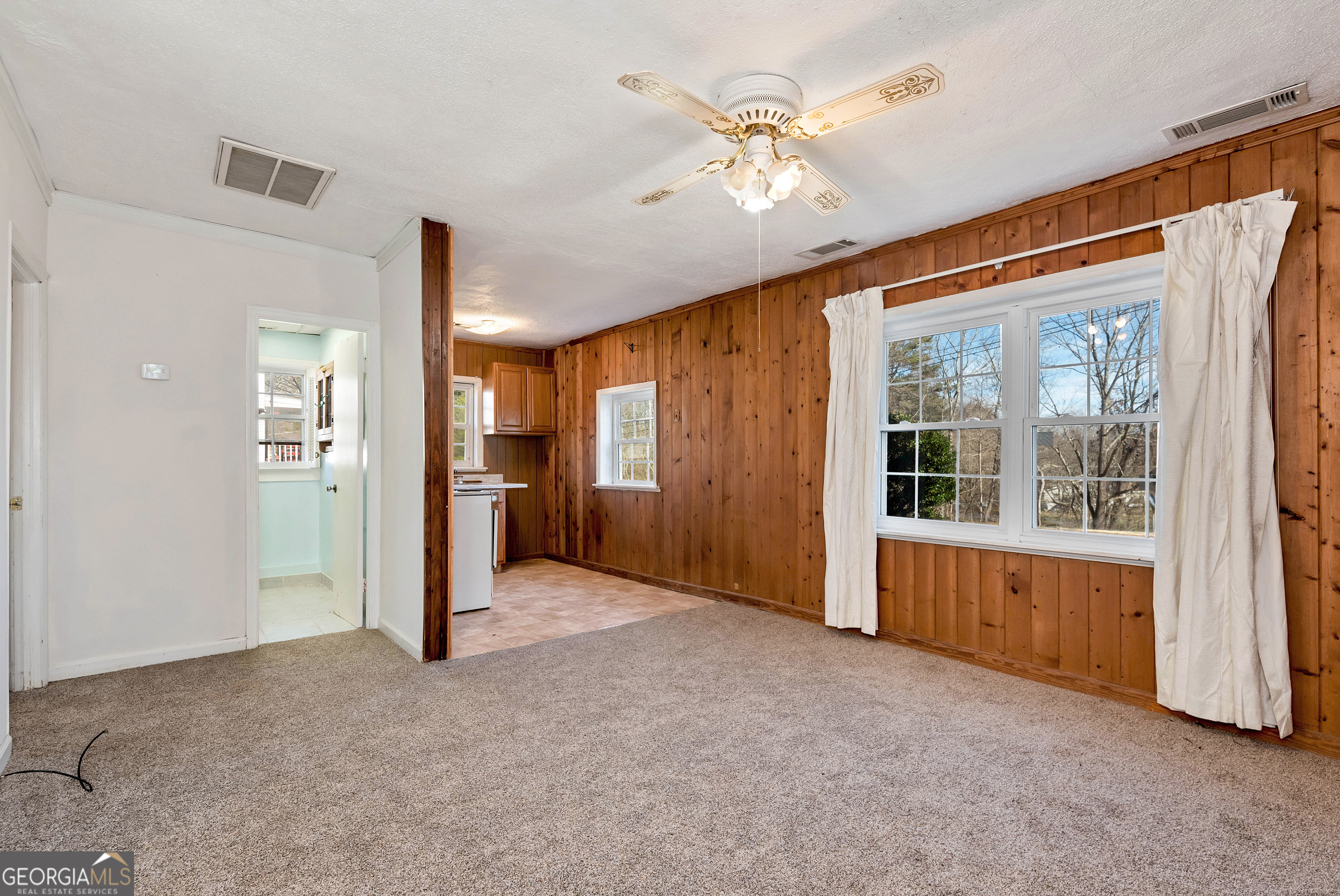 303 Jennys Cove Road Cleveland, GA 30528 - Photo 39 of 60 a view of an empty room with a window