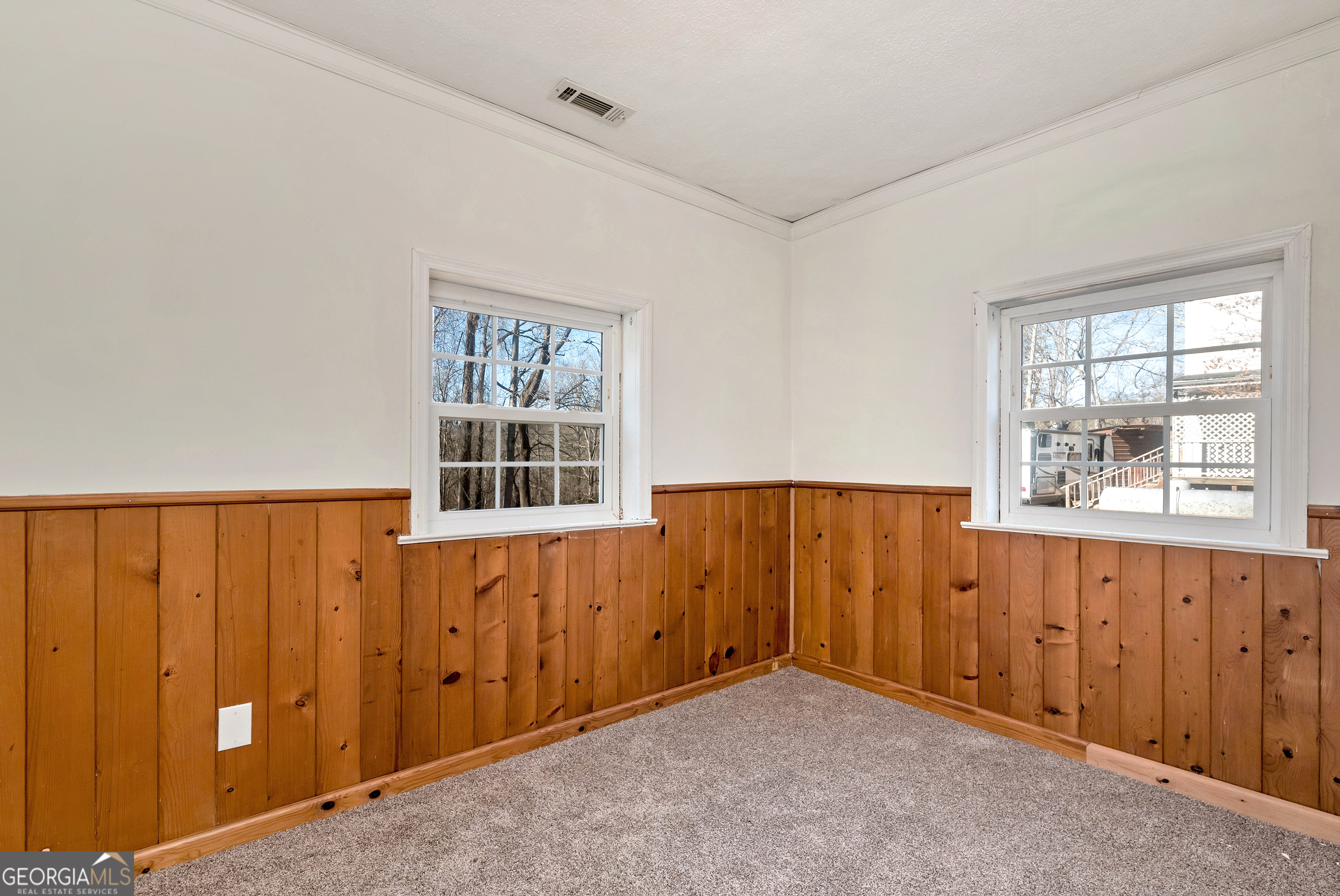 303 Jennys Cove Road Cleveland, GA 30528 - Photo 41 of 60 an empty room with windows