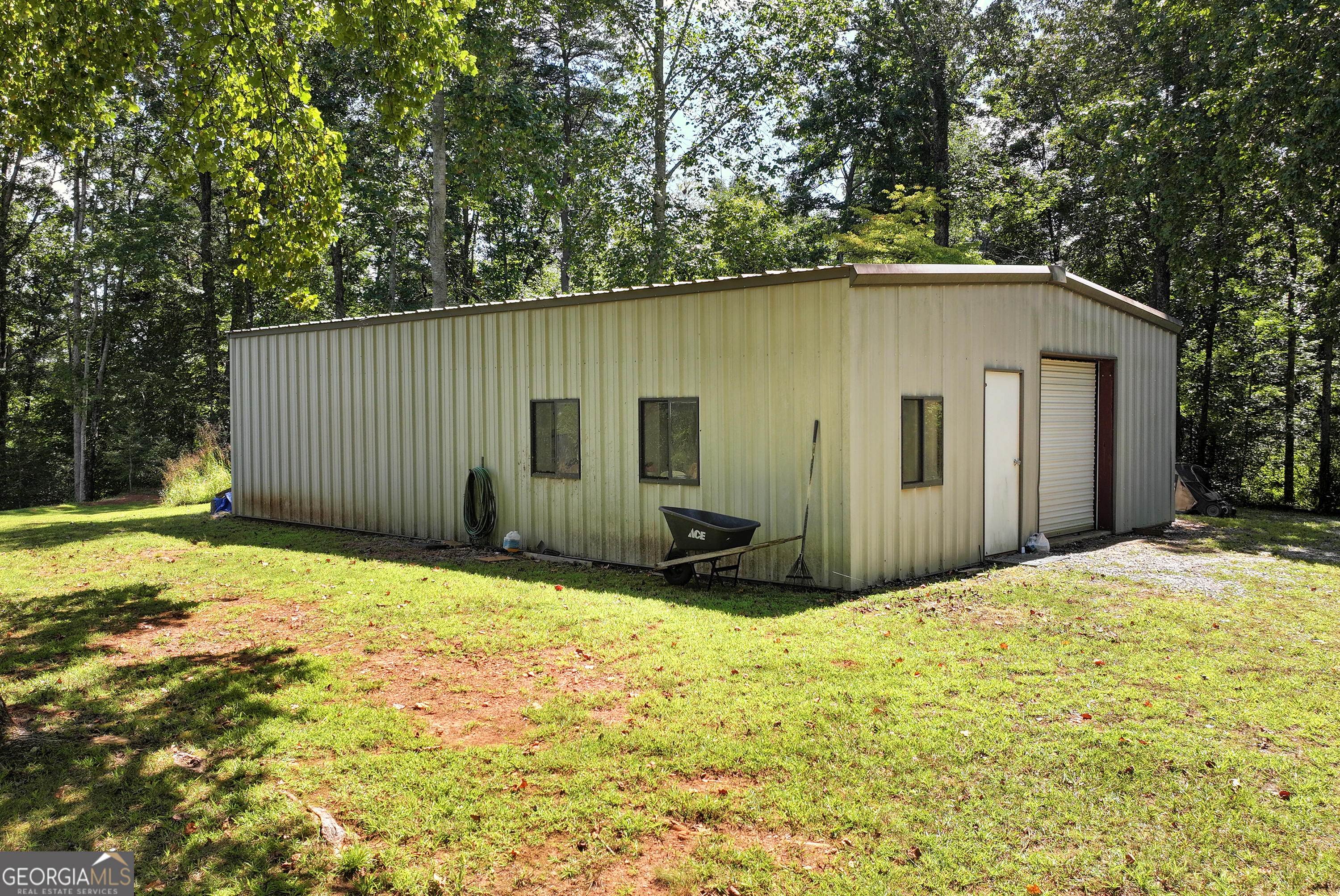 303 Jennys Cove Road Cleveland, GA 30528 - Photo 50 of 60 front view of a house with a yard