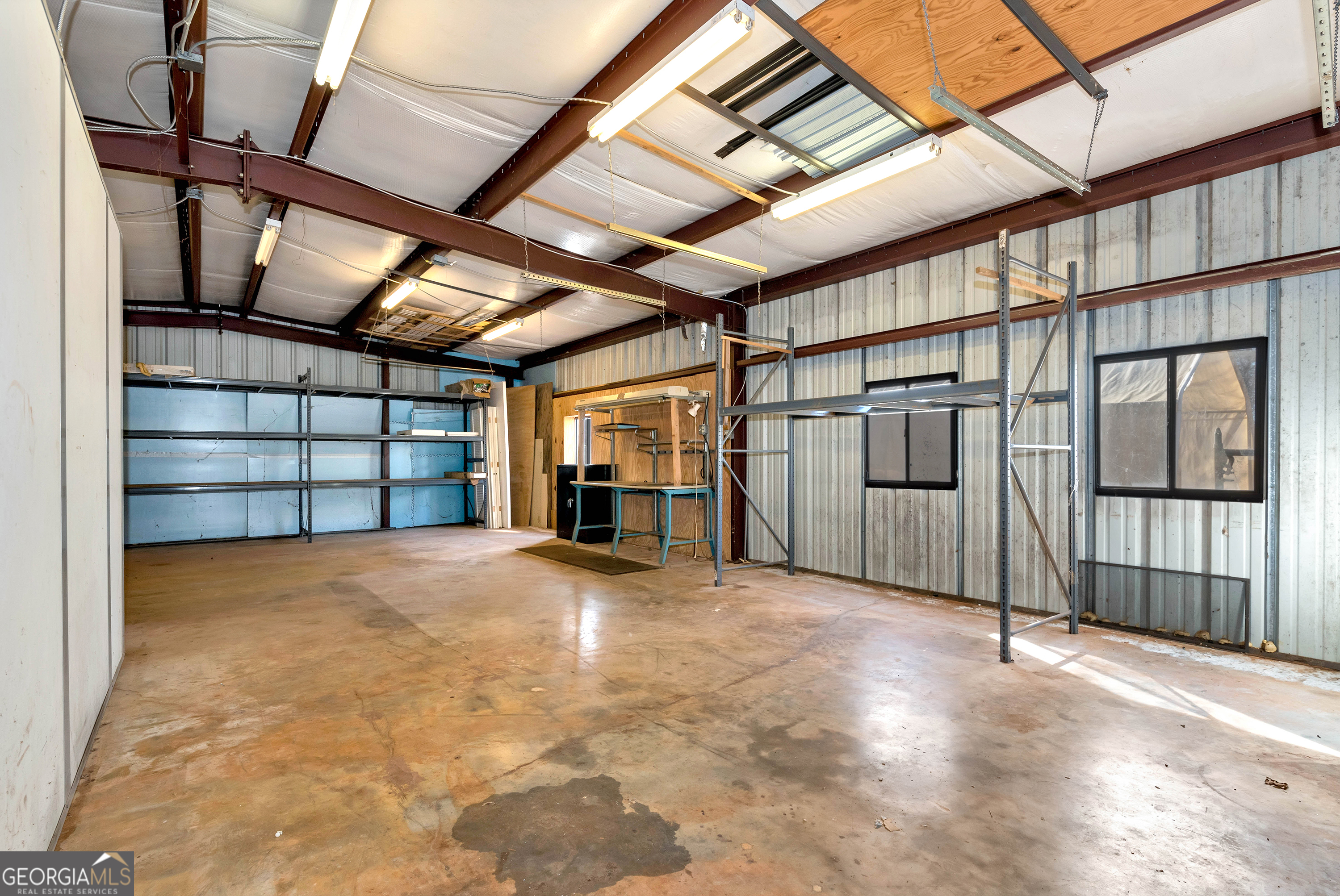 303 Jennys Cove Road Cleveland, GA 30528 - Photo 52 of 60 a view of an empty room with a staircase