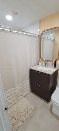 a room with a cabinets and a sink