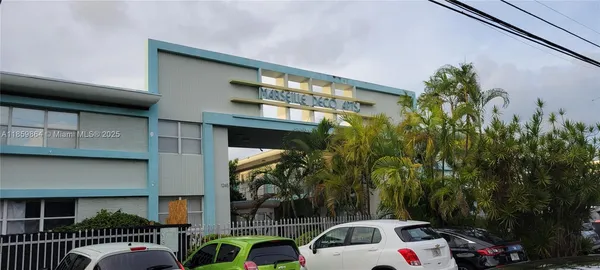 a view of a car parked in front of a building