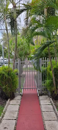 a view of backyard with a patio