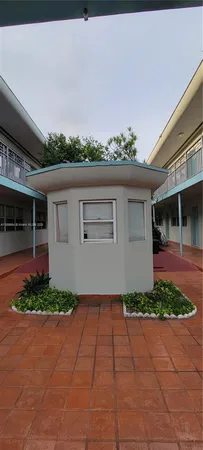a house with trees in front of it