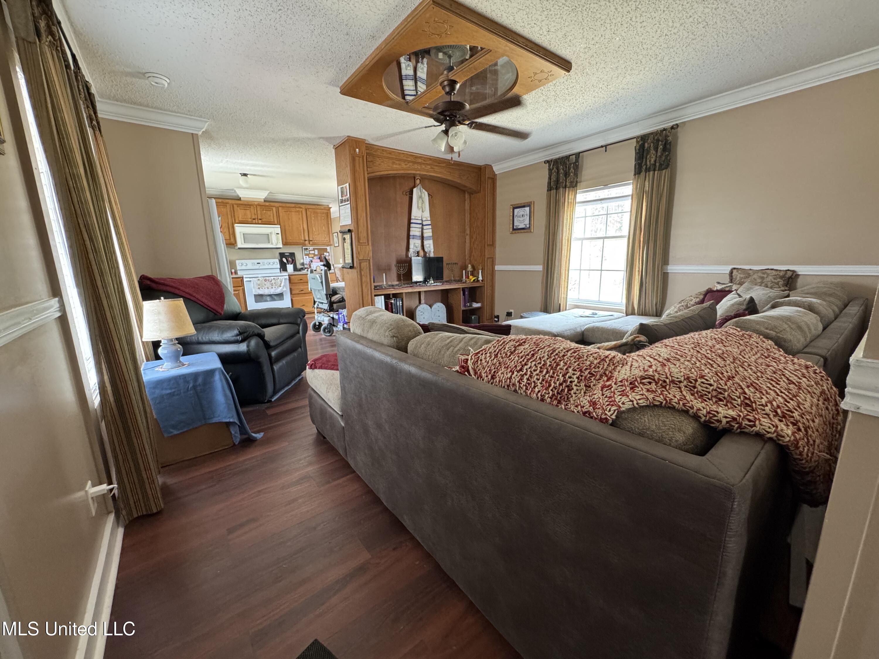 23951 Standard Cemetery Road Kiln, MS 39556 - Photo 13 of 36 Living Room into Kitchen
