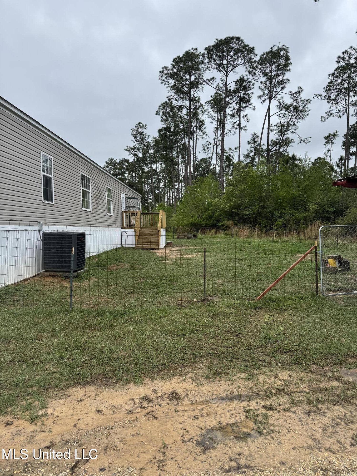 23951 Standard Cemetery Road Kiln, MS 39556 - Photo 31 of 36 Backyard fenced for dog's
