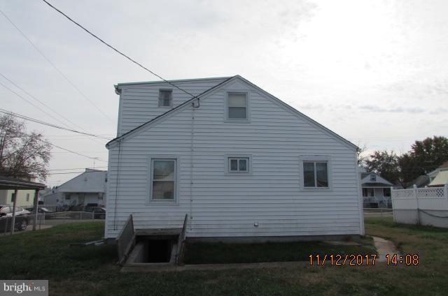 208 German Hill Road Baltimore, MD 21222 - Photo 3 of 24 a view of a house with a yard