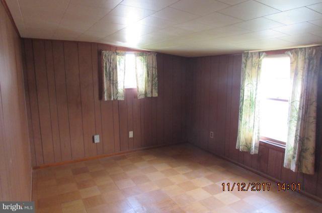 208 German Hill Road Baltimore, MD 21222 - Photo 22 of 24 an empty room with windows and closet
