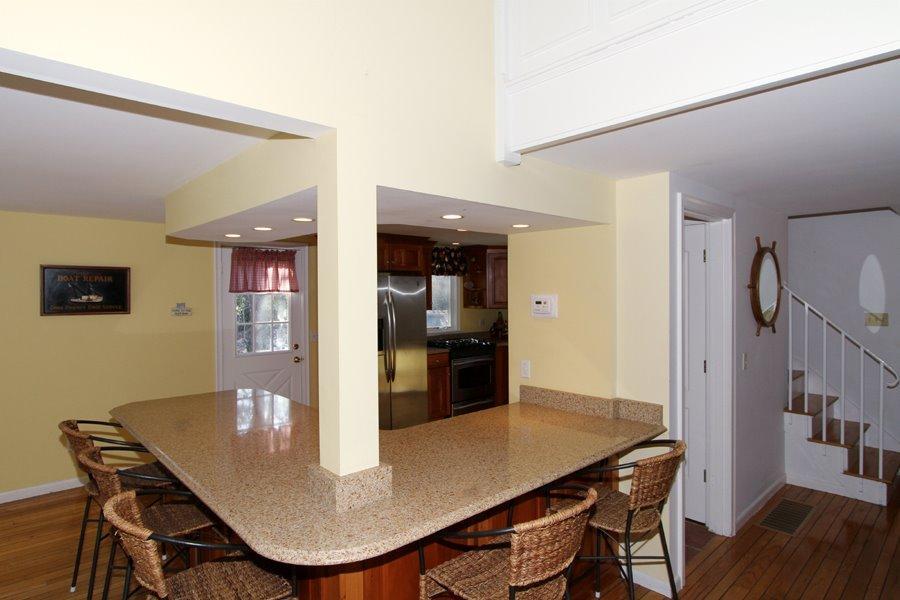 162 Greensward Road Mashpee, MA 02649 - Photo 8 of 26 a view of a dining room with furniture