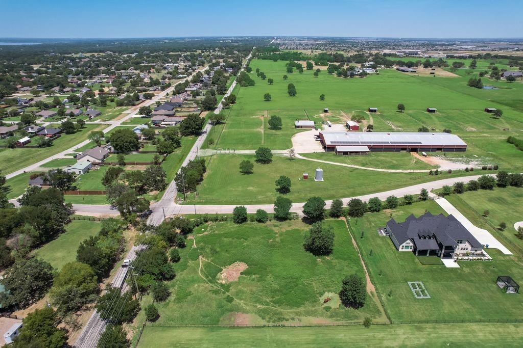 521 Martingale Trail Oak Point, TX 75068 - Photo 12 of 36 an aerial view of a golf course with parking space